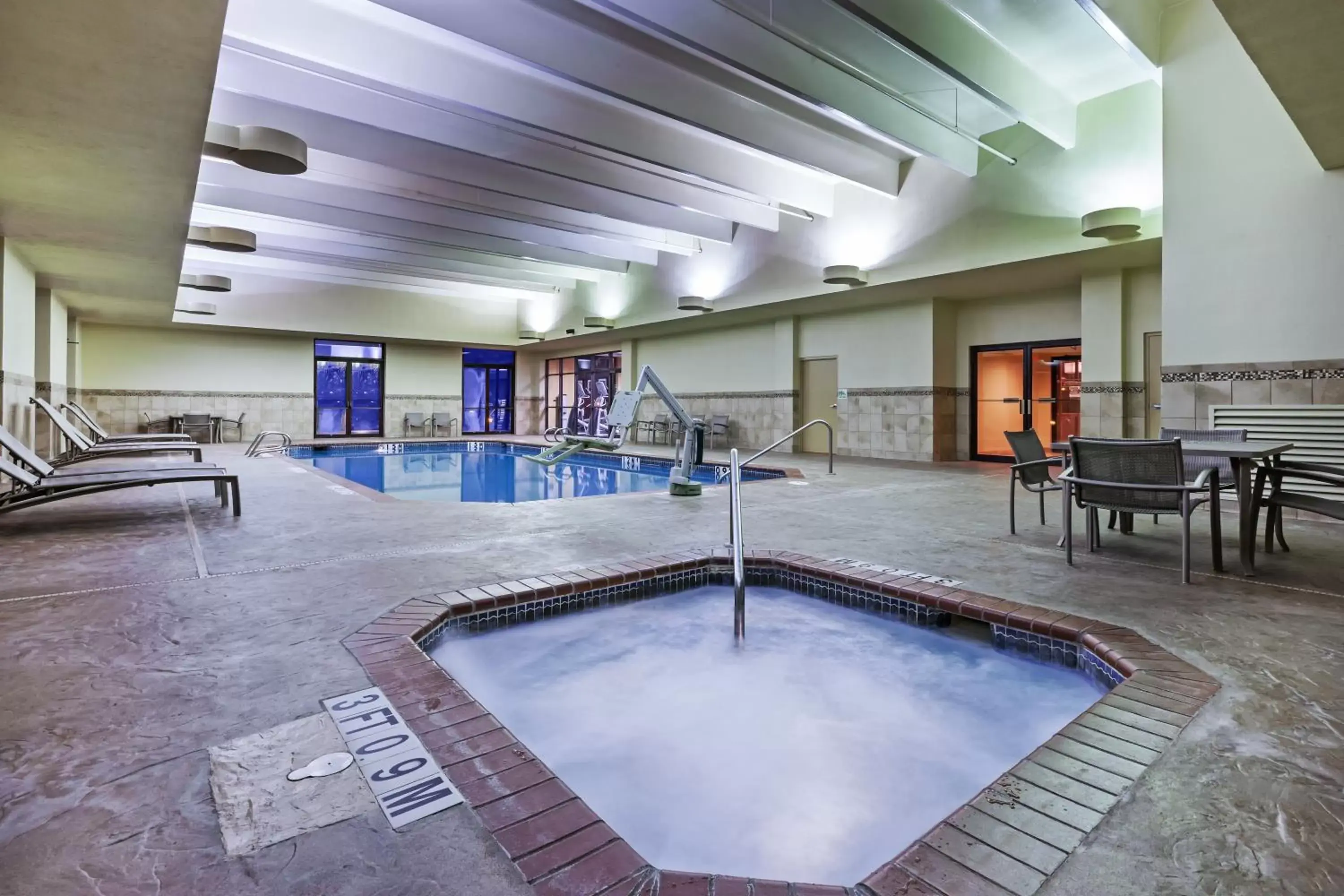 Swimming Pool in Holiday Inn Springdale-Fayetteville Area, an IHG Hotel