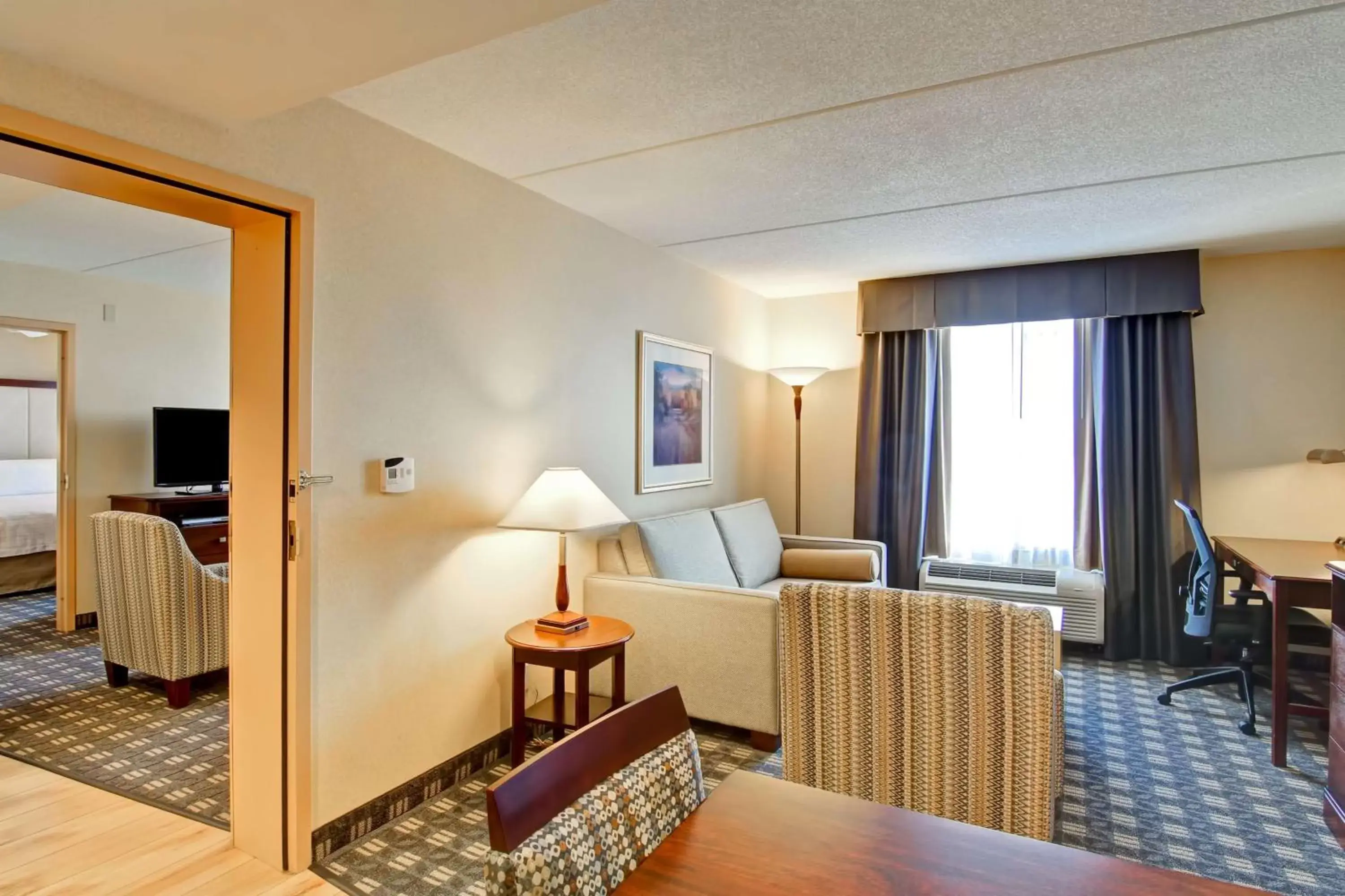 Bedroom, Seating Area in Homewood Suites by Hilton Toronto-Mississauga