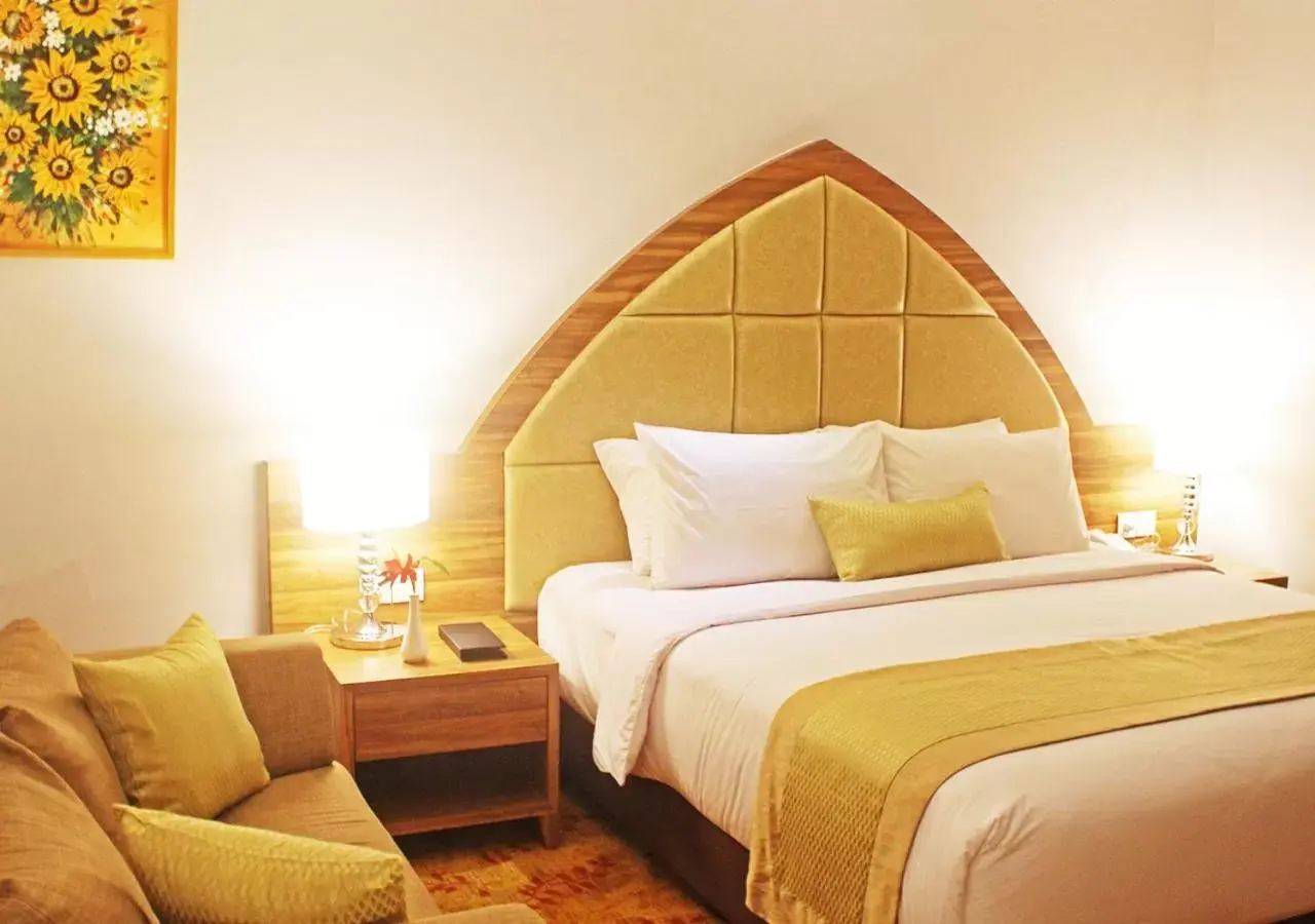 Bed in Grand Serela Yogyakarta by KAGUM Hotels