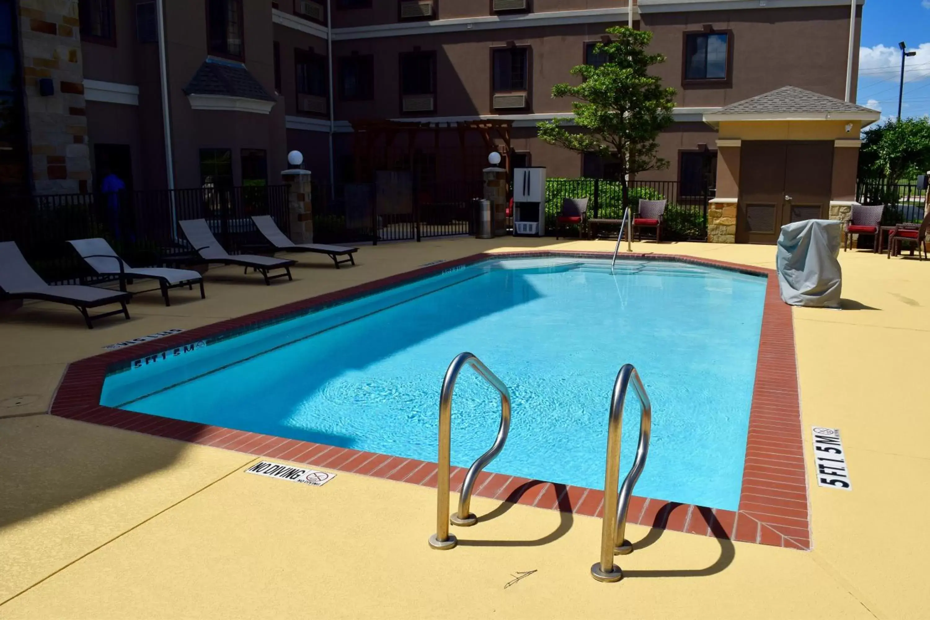 Swimming pool in Staybridge Suites Houston Stafford - Sugar Land, an IHG Hotel