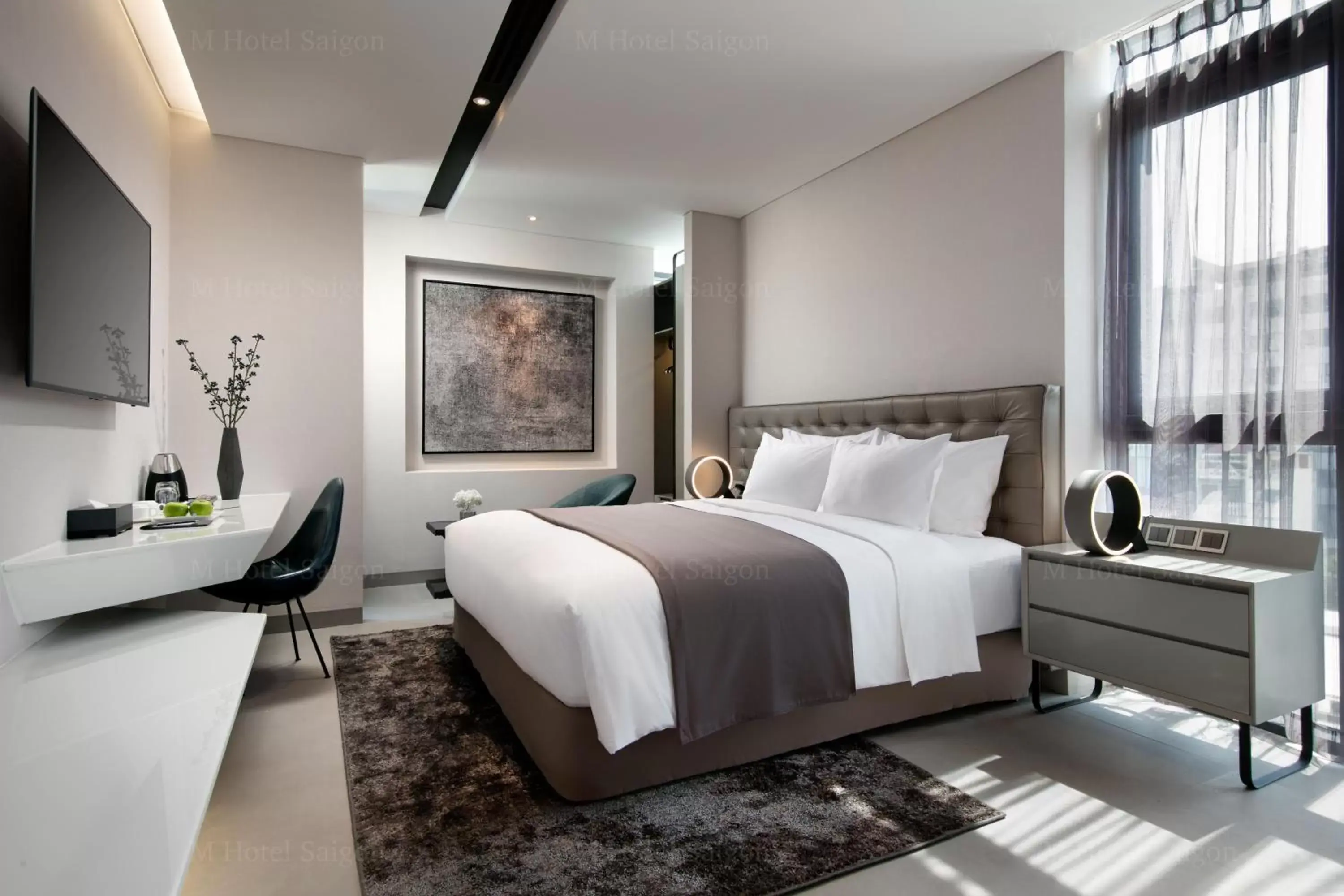 Photo of the whole room, Bed in M Hotel Saigon Photo of the whole room, Bed in M Hotel Saigon