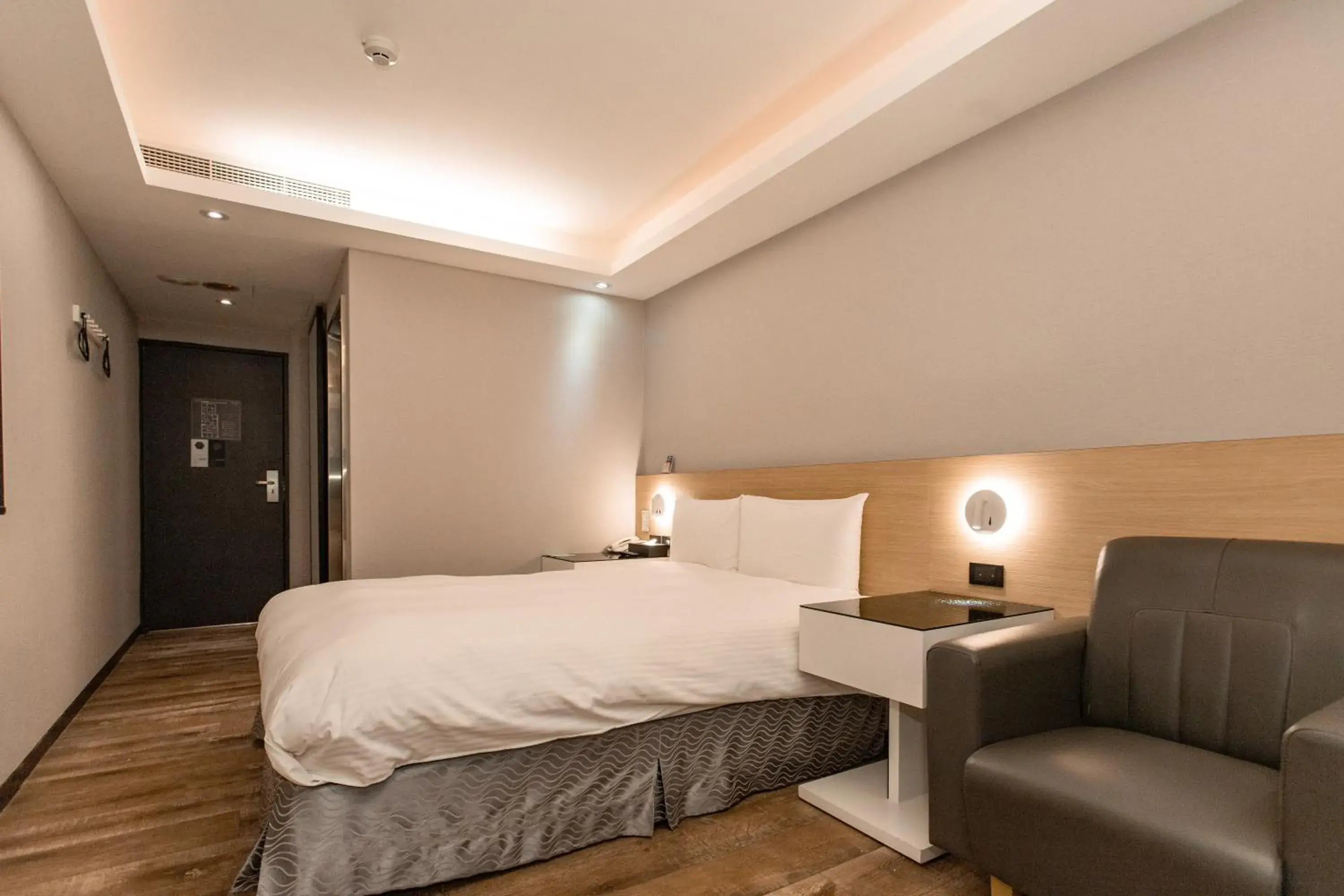 Bed in Hub Hotel Tucheng