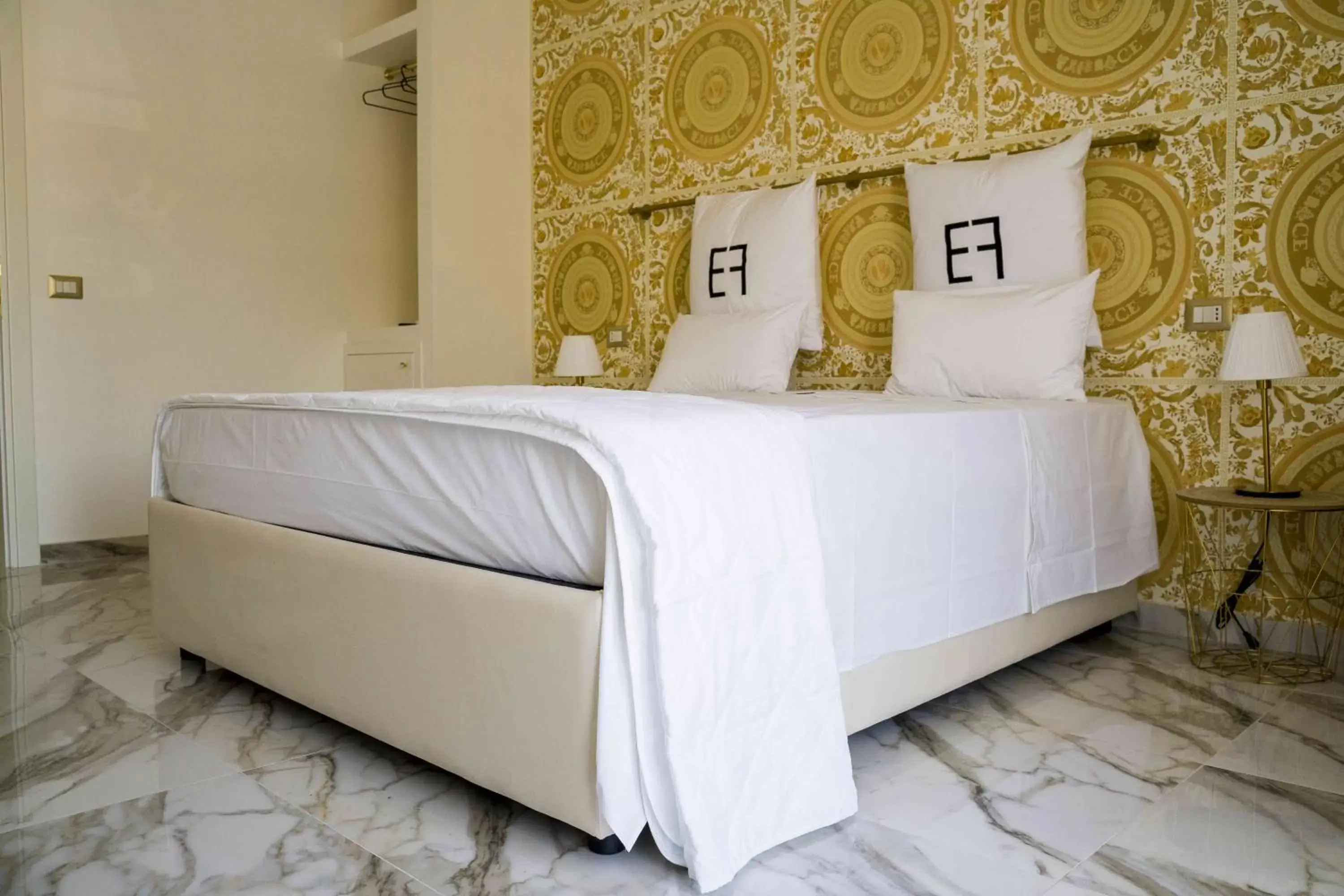 Bed in EF LUXURY LIVING RESORT AND SPA