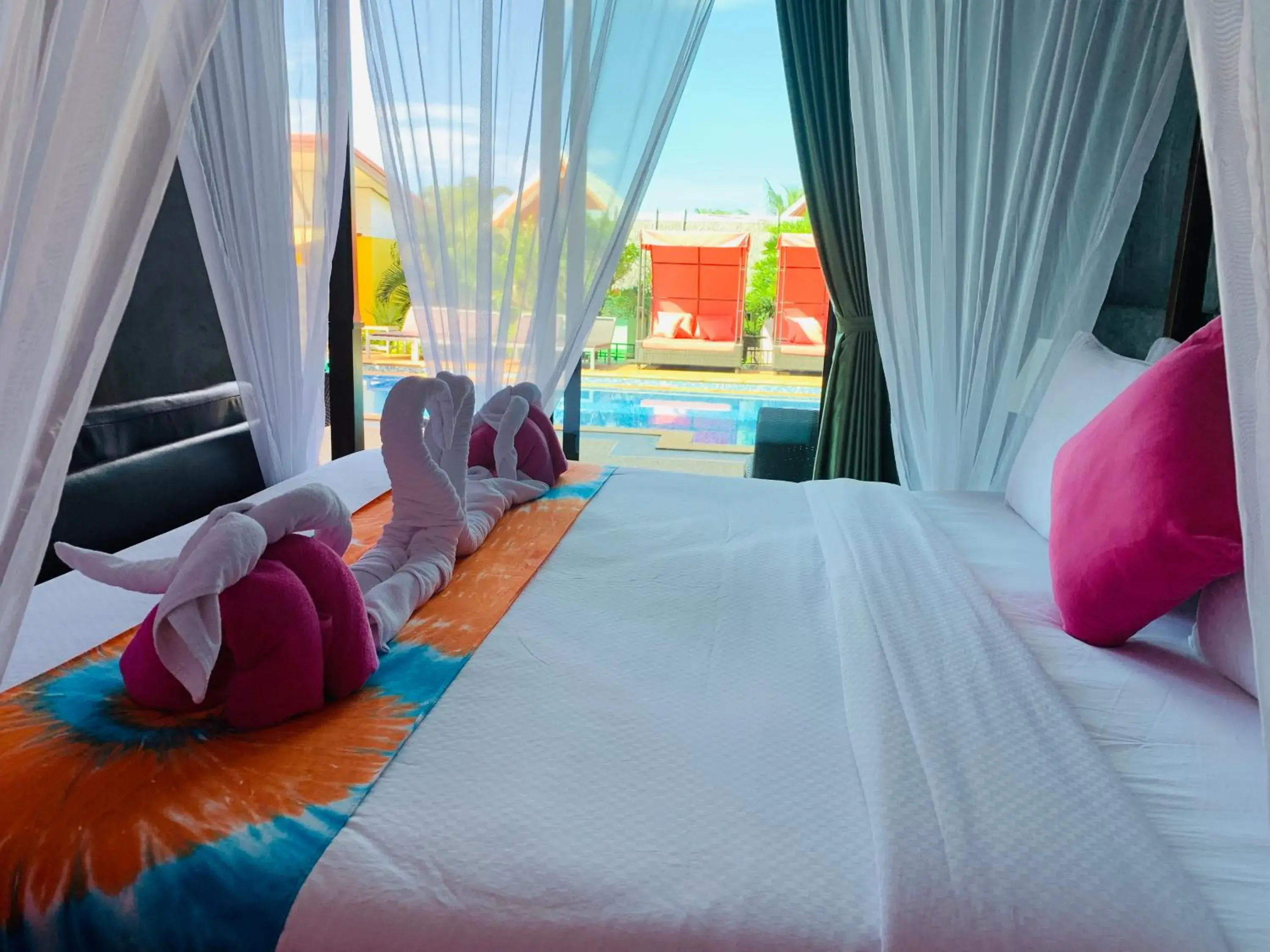 Bed in Pinky Bungalow Resort - SHA Extra Plus