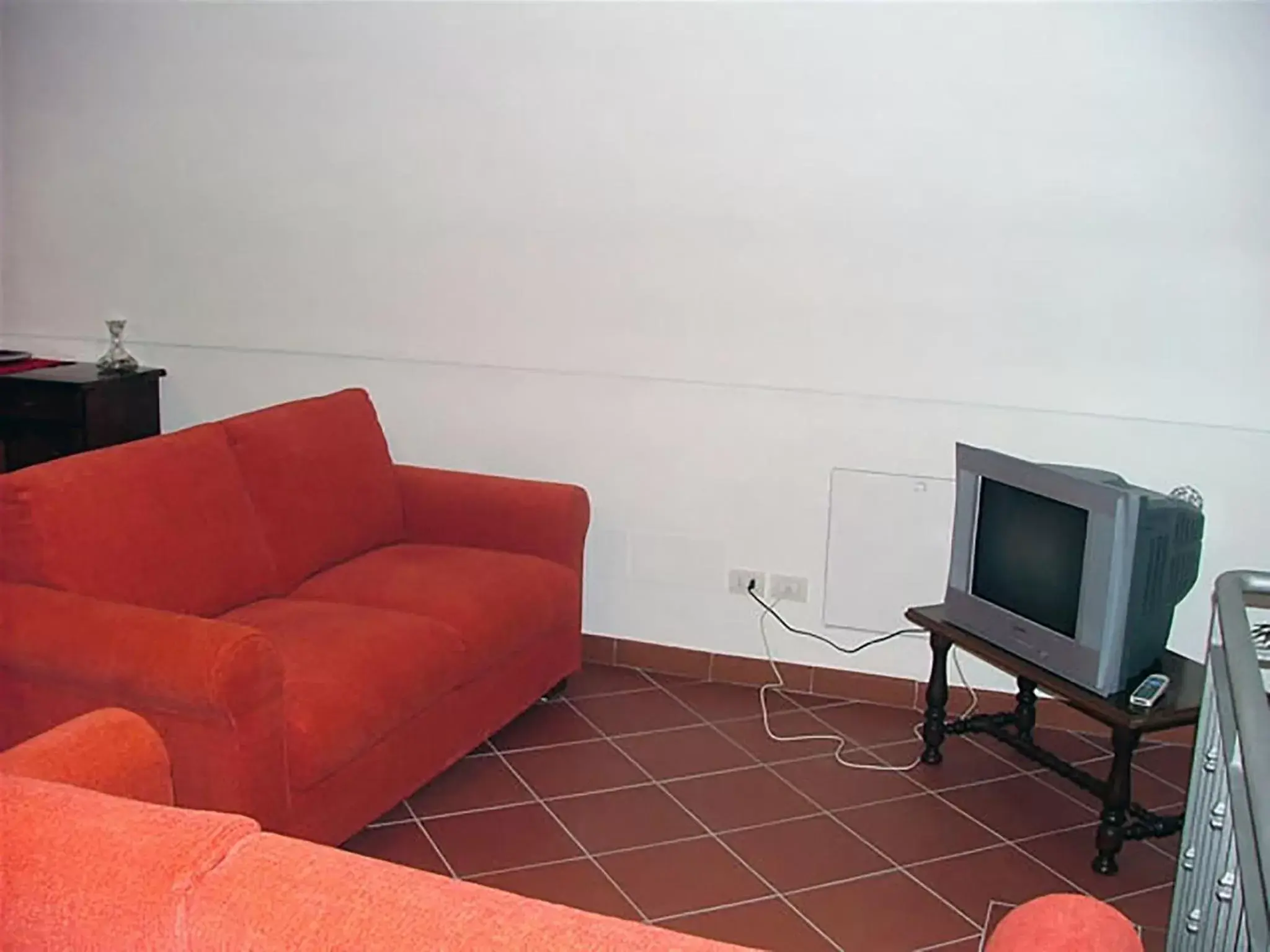 Communal lounge/ TV room, TV/Entertainment Center in B&B San Rocco