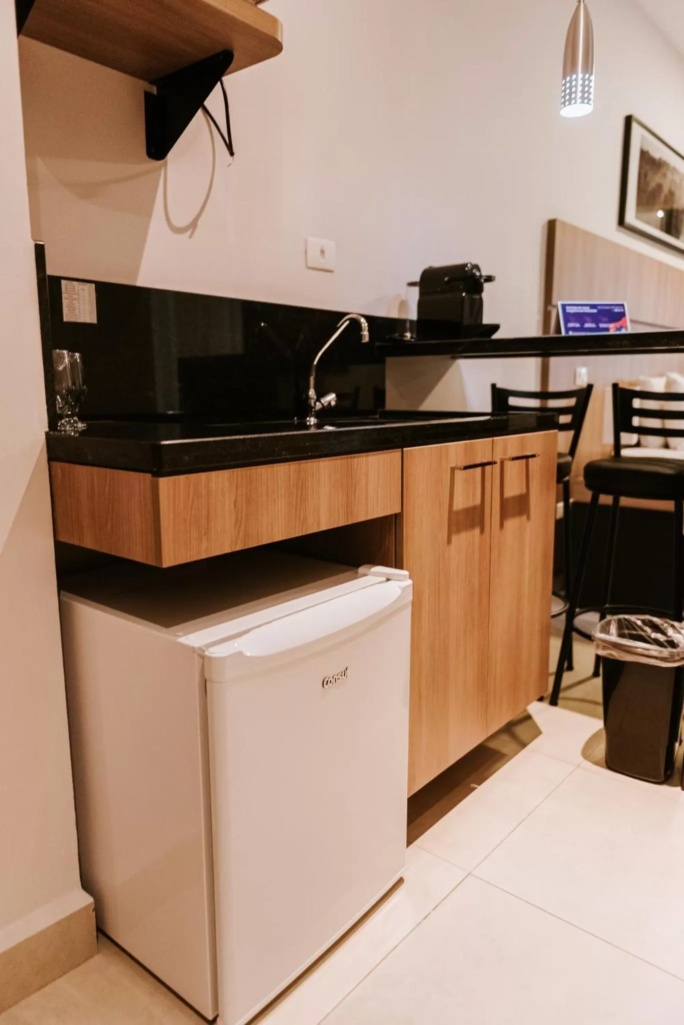 Kitchen or kitchenette in Occitano Apart Hotel