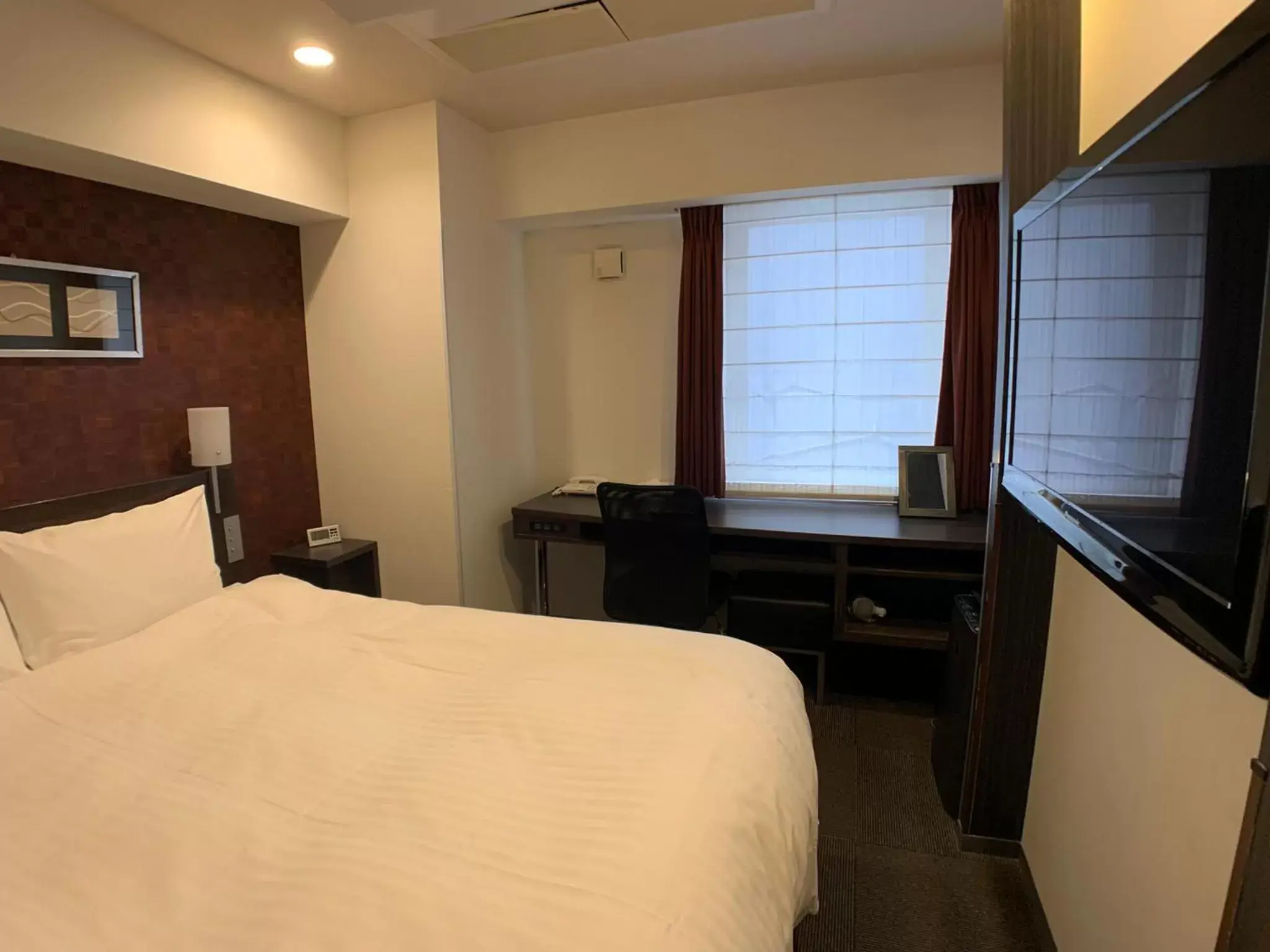 Photo of the whole room, Bed in Smile Hotel Nagoya Sakae