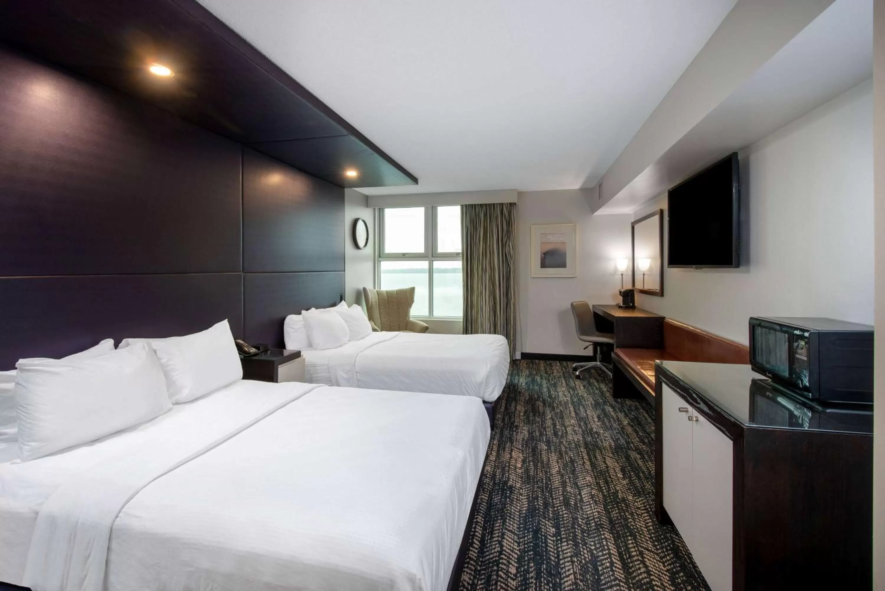 Photo of the whole room, Bed in 41 Lakefront Hotel, Trademark Collection by Wyndham