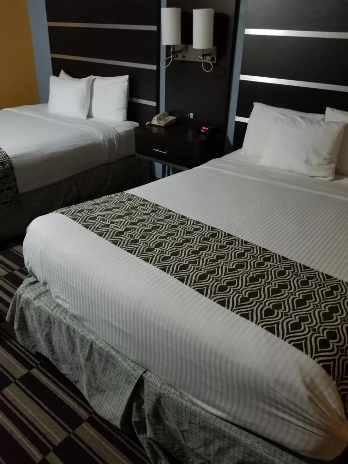 Bed in Microtel Inn & Suites by Wyndham Riverside