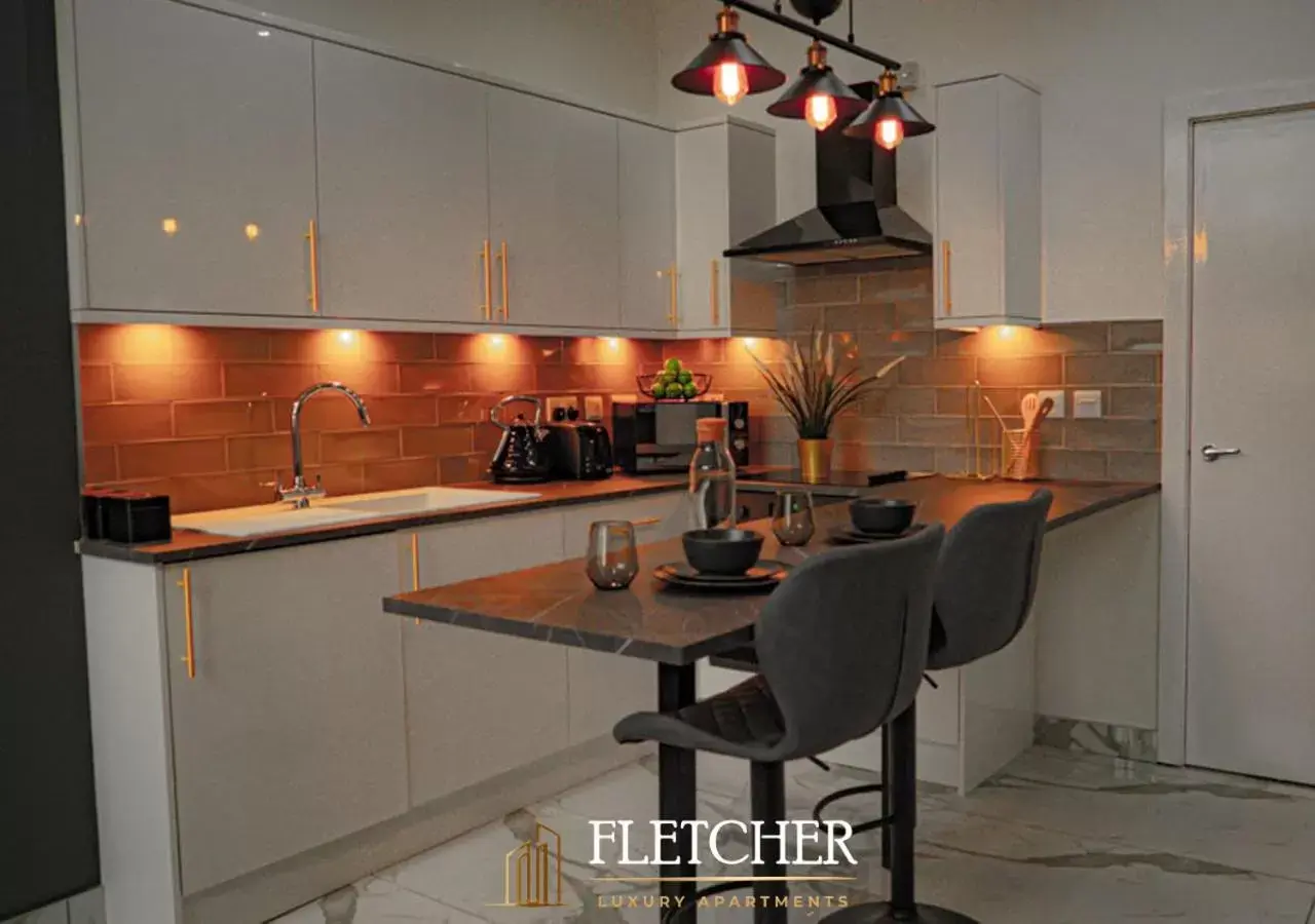 Kitchen/Kitchenette in Fletcher Apartments