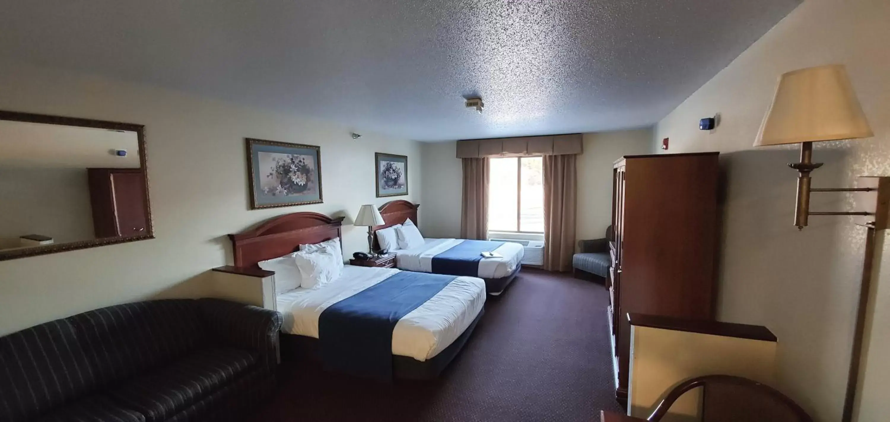 Executive Queen Suite with Two Queen Beds in Stay USA Hotel and Suites