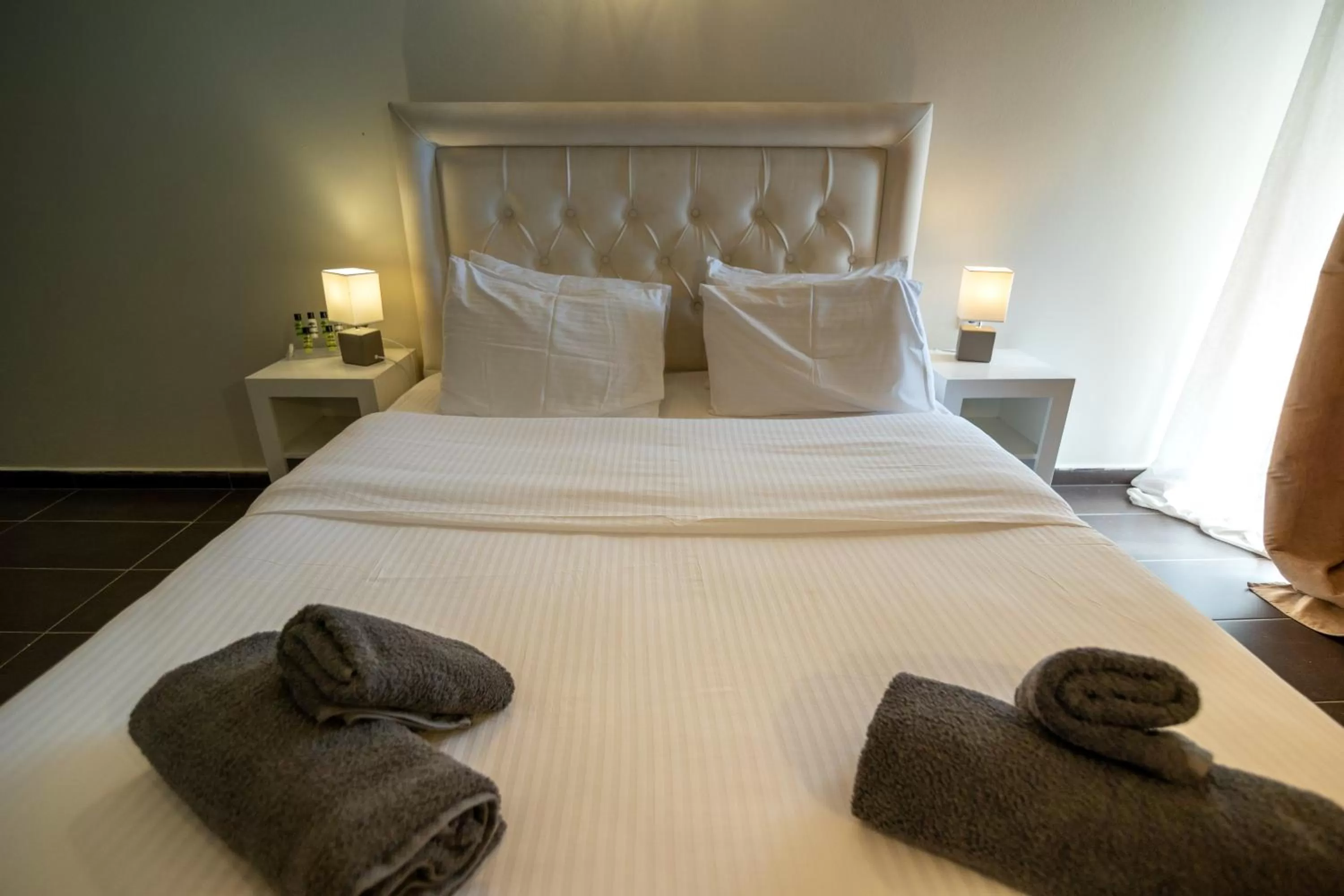 Bed in Votsalakia Hotel & Luxury Apartments