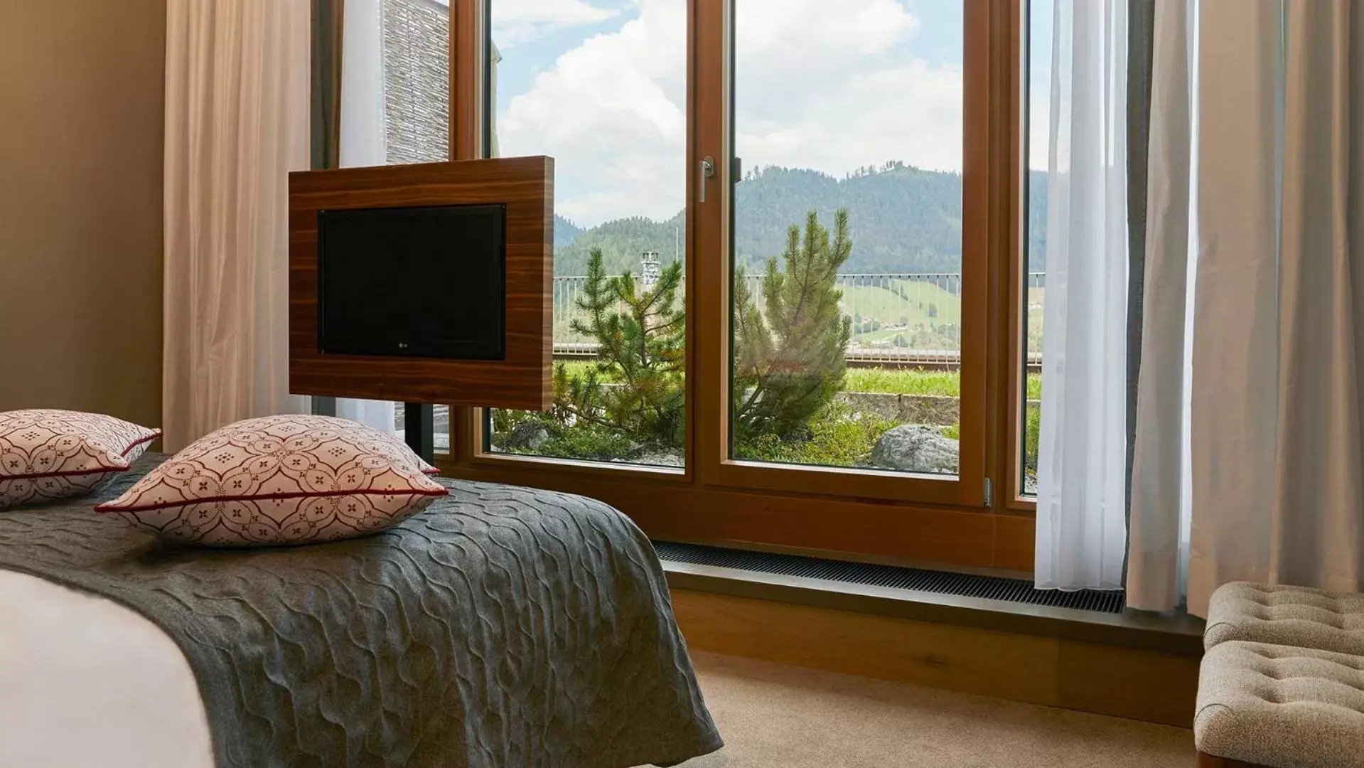 Bedroom, TV/Entertainment Center in Kempinski Hotel Berchtesgaden