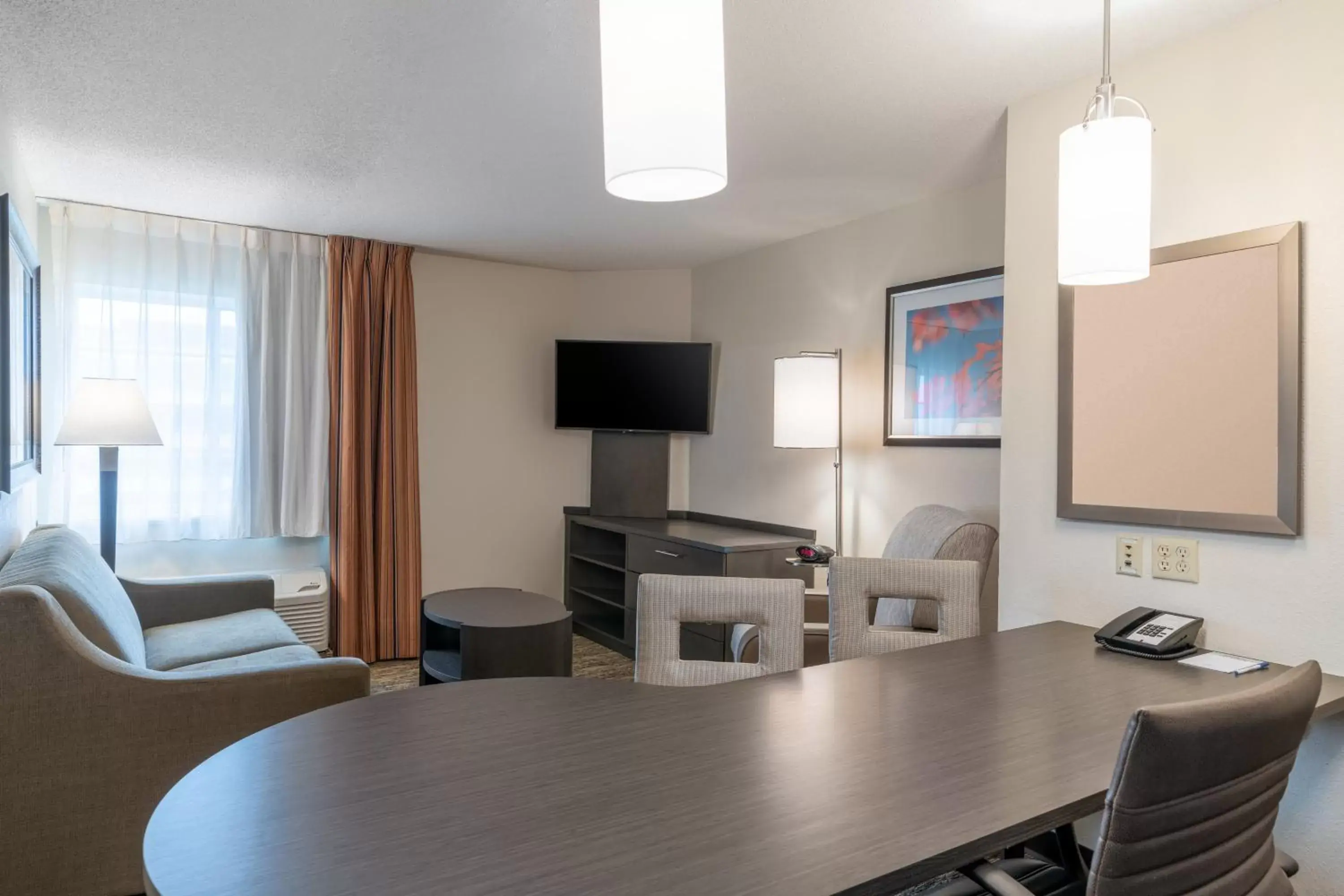 Photo of the whole room, TV/Entertainment Center in Candlewood Suites Washington-Dulles Herndon, an IHG Hotel