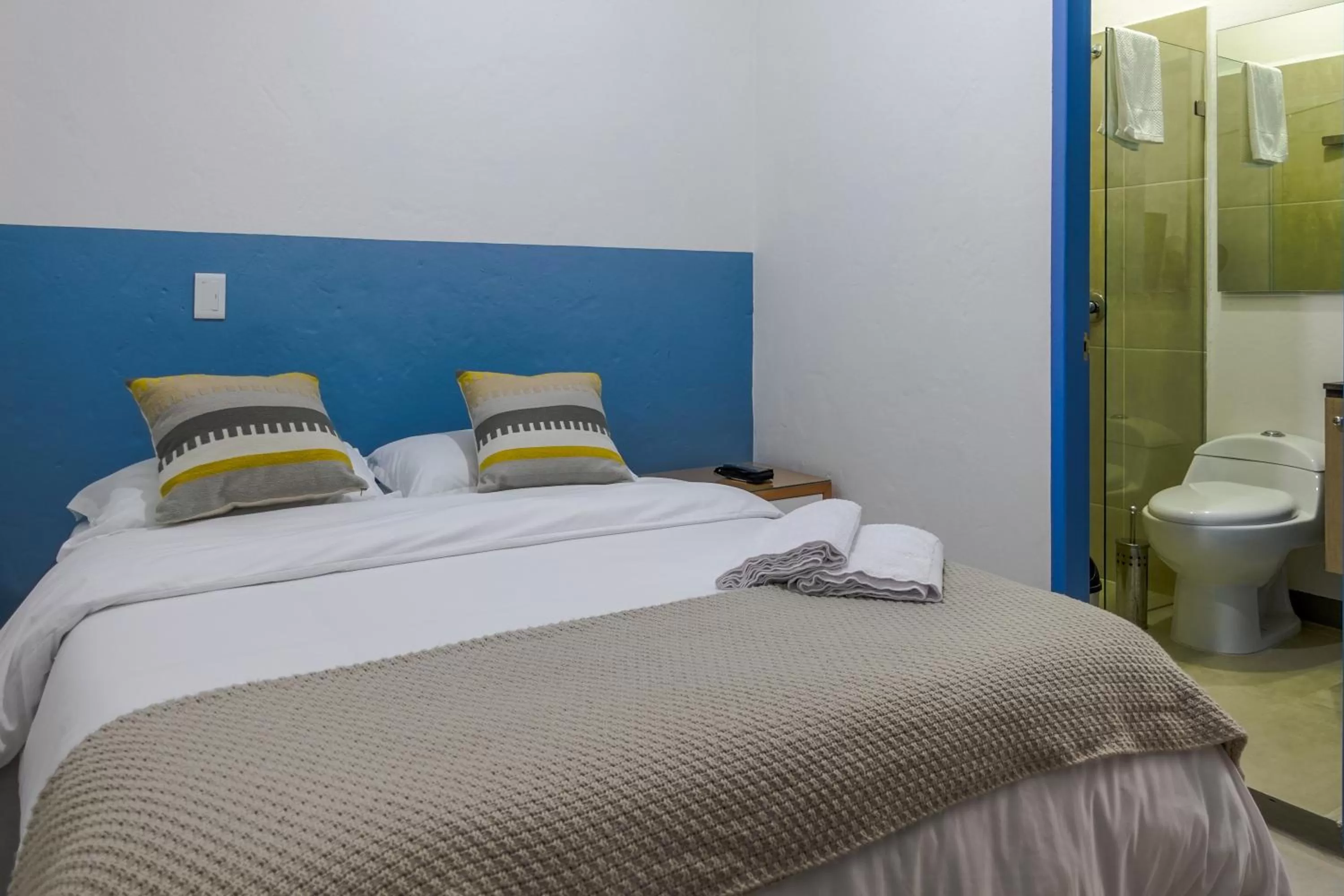 Bedroom, Bed in Hotel Azulado Jericó