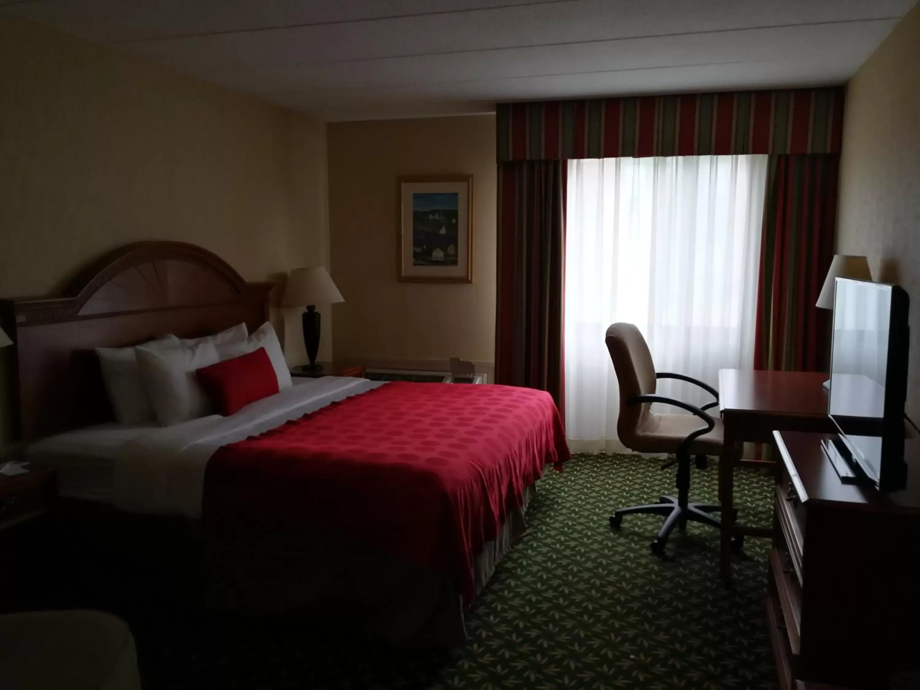 Bed in Mystic River Hotel & Suites