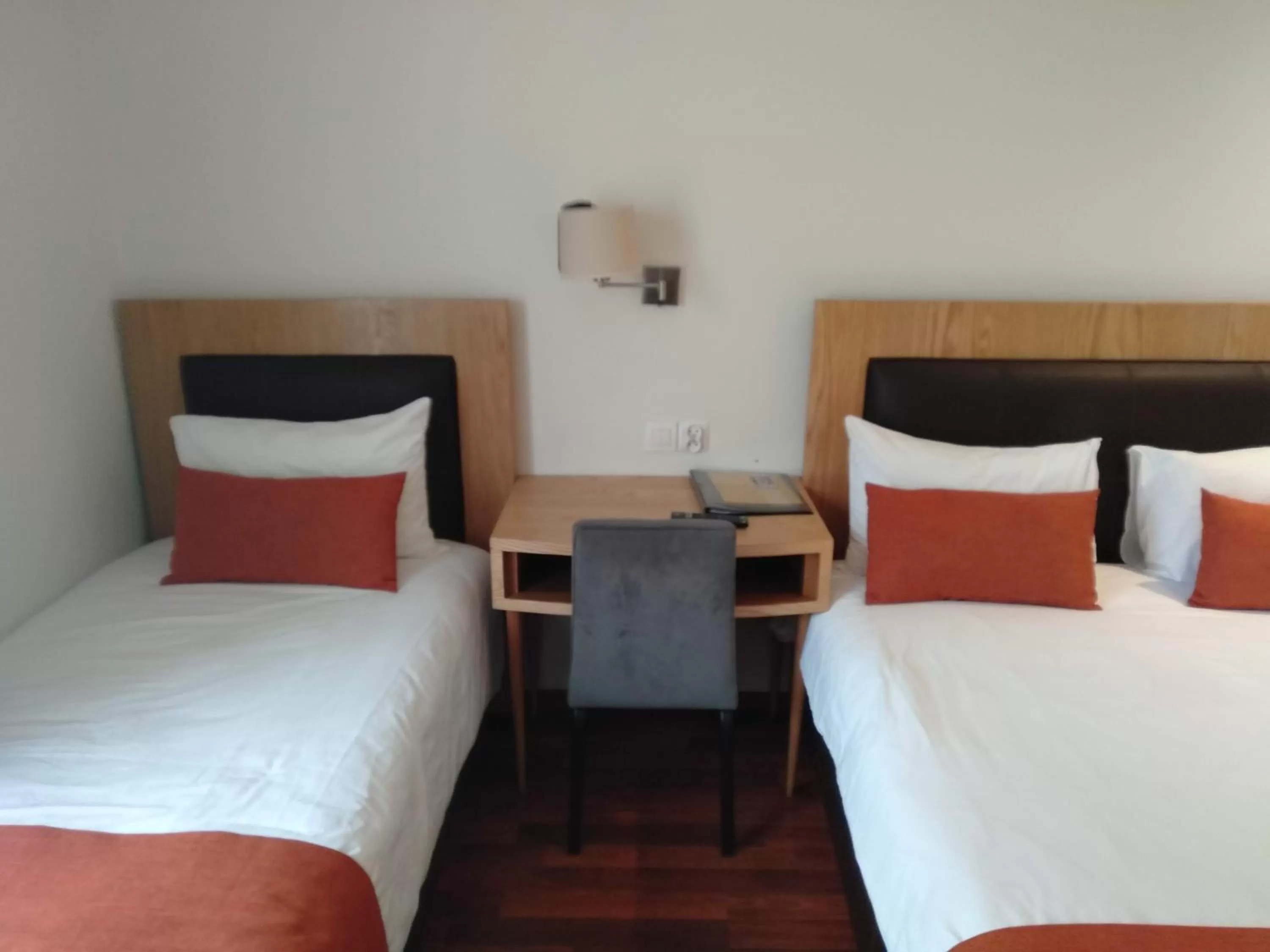 Bed in Le Pietri Urban Hotel