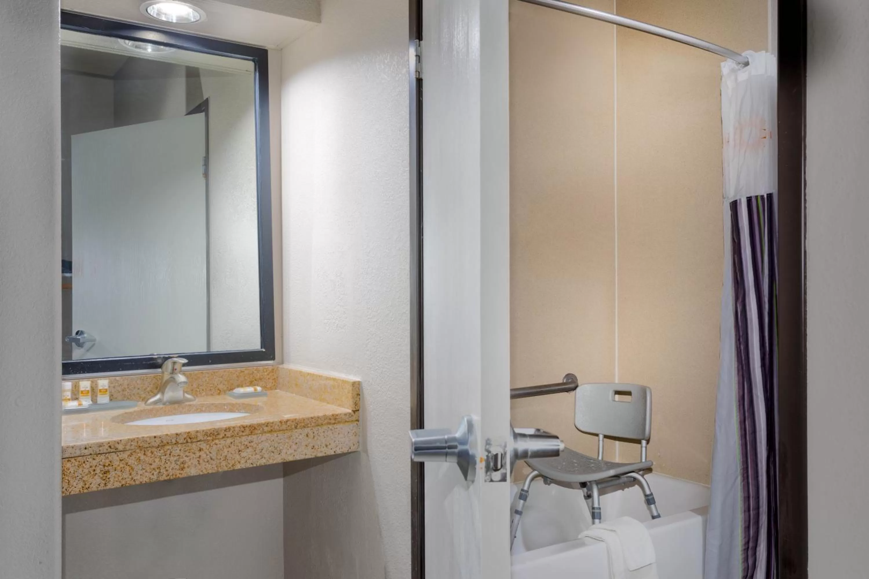 Bathroom in Baymont by Wyndham Henderson-Northeast Denver