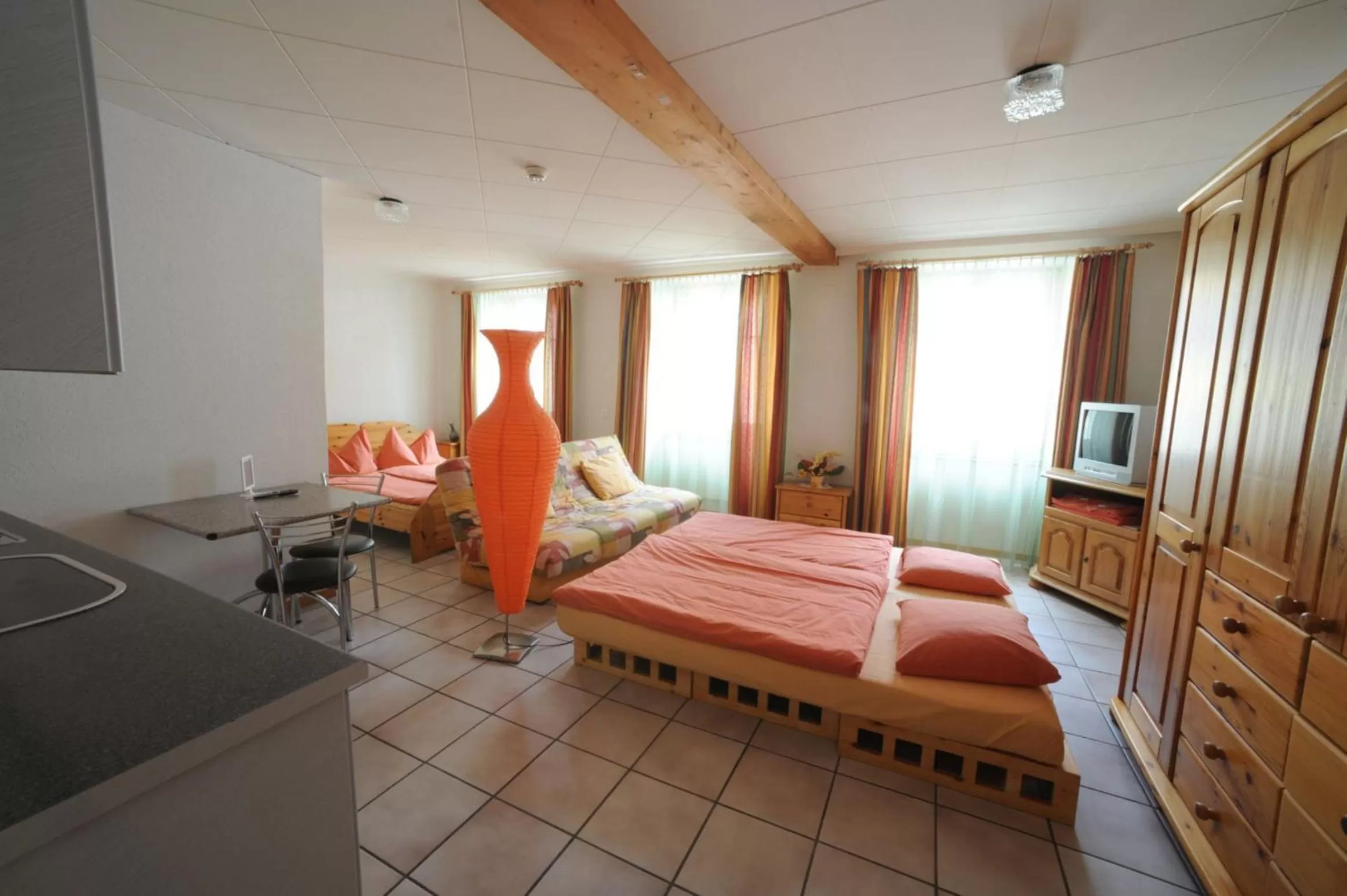 Bed in Chez Gilles hôtel resto bar SA