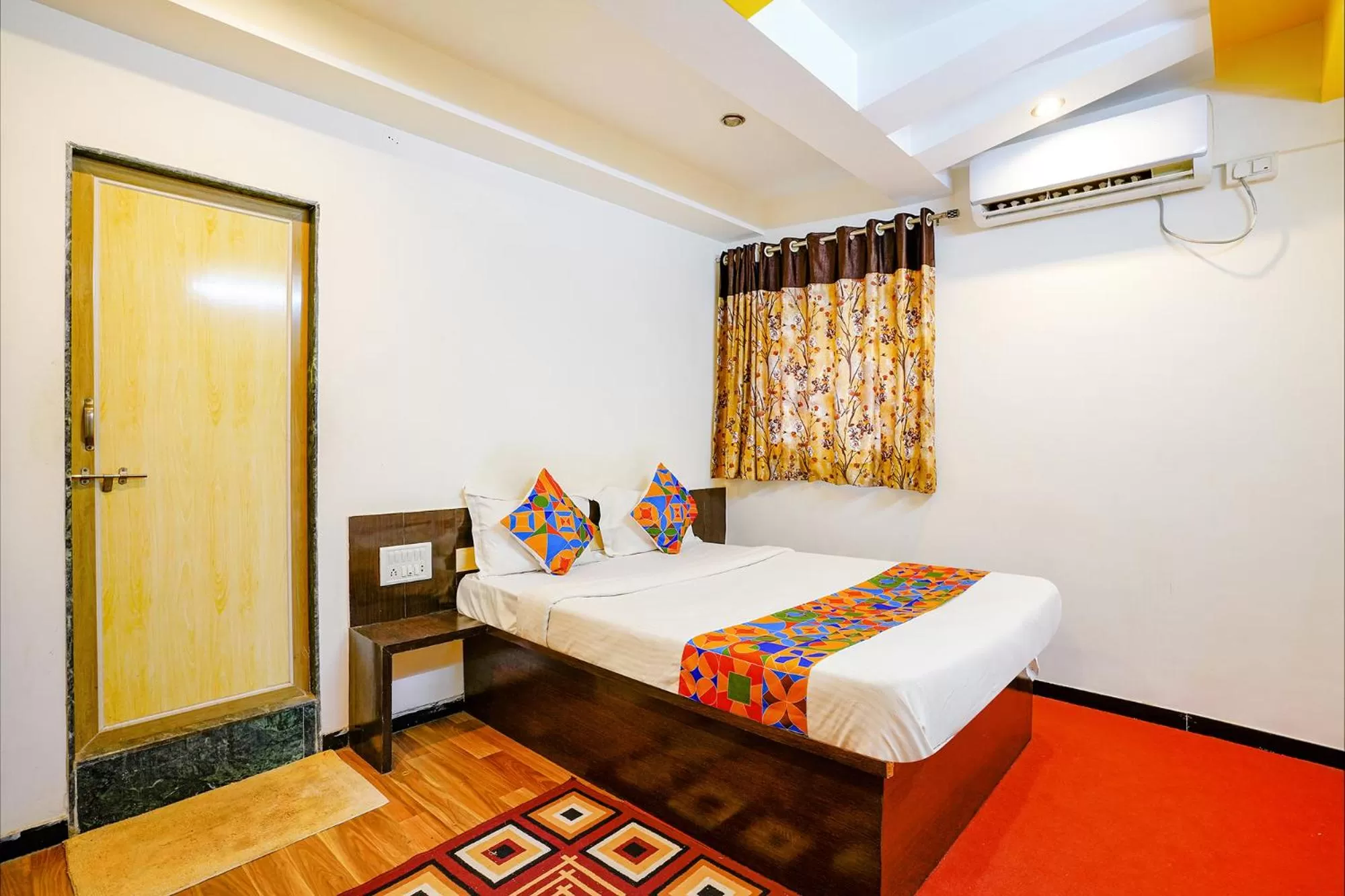 Bed in FabHotel Sai Chatra