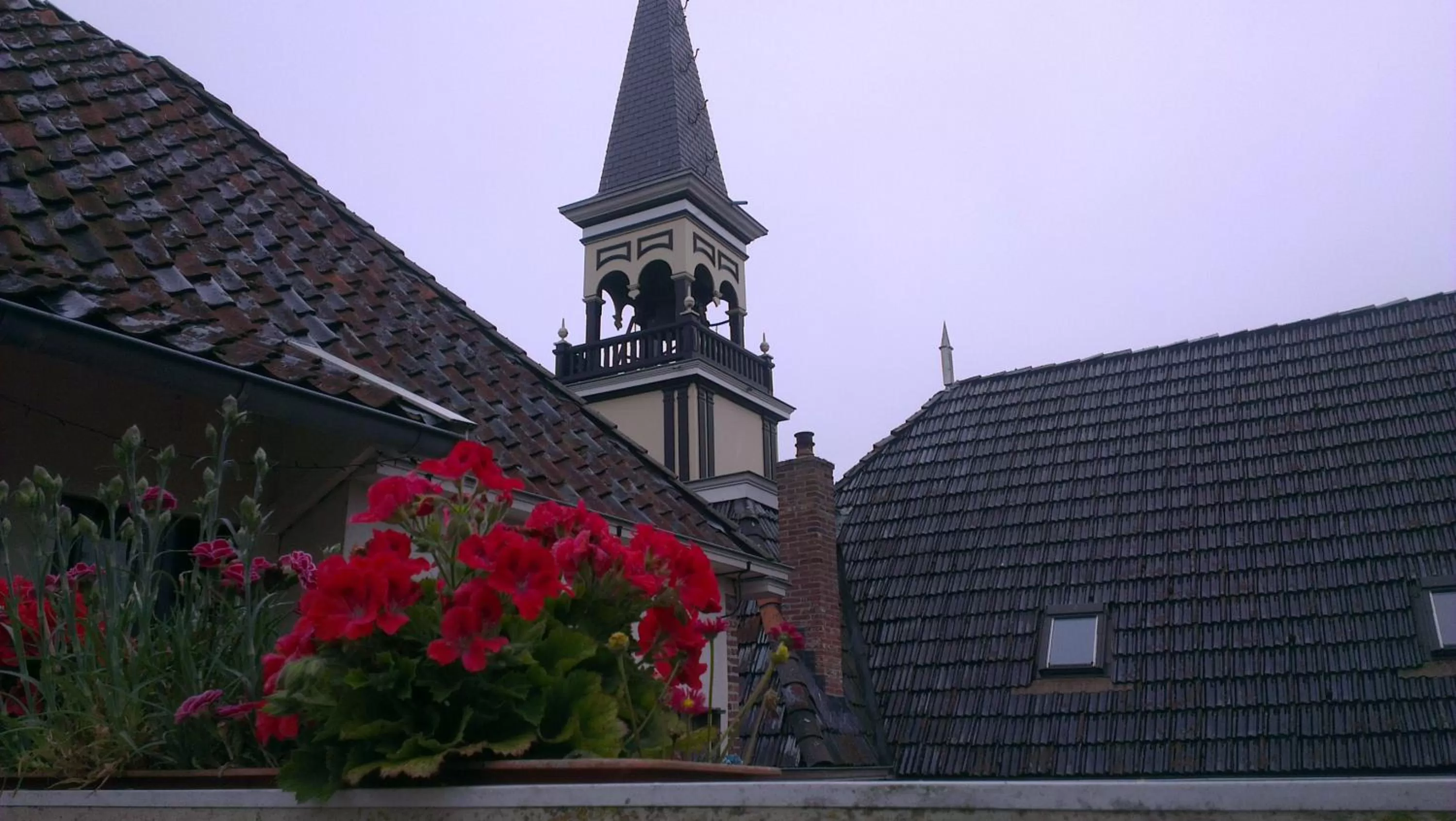 Property Building in Logement 'De witte klok'