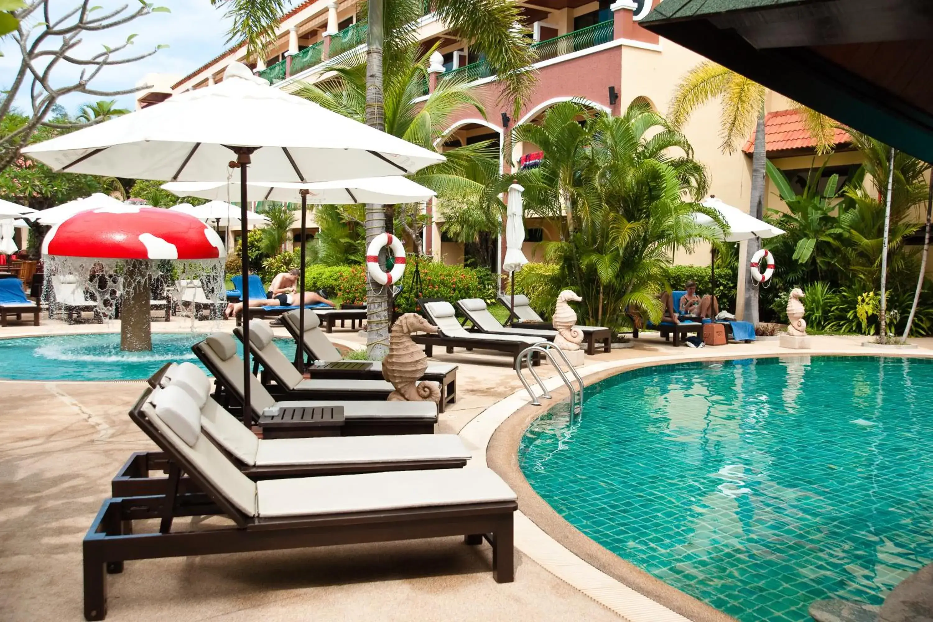 Swimming pool in Karon Sea Sands Resort-SHA PLUS Swimming pool in Karon Sea Sands Resort-SHA PLUS
