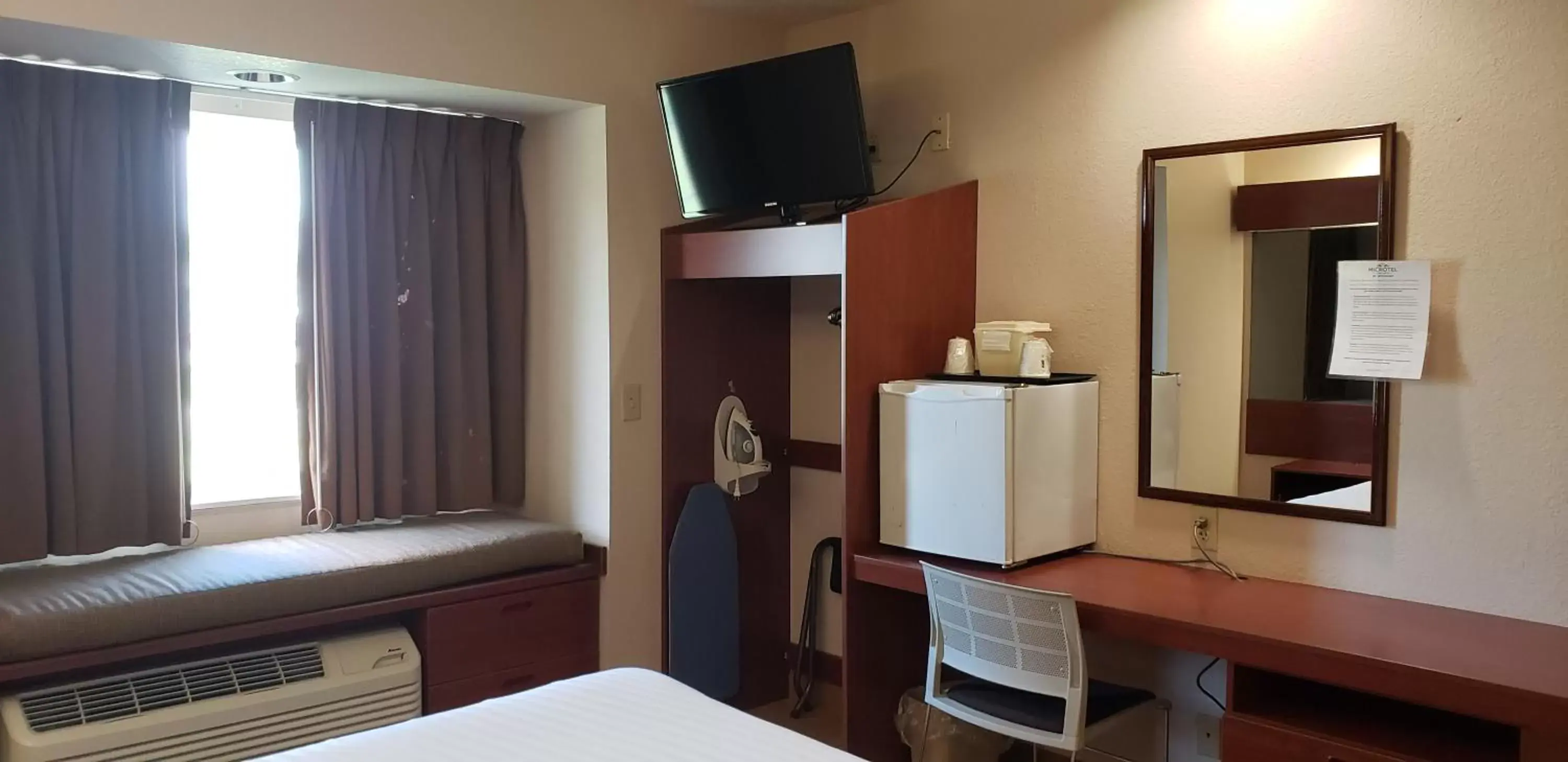 TV/Entertainment Center in Microtel Inn & Suites by Wyndham Wellsville