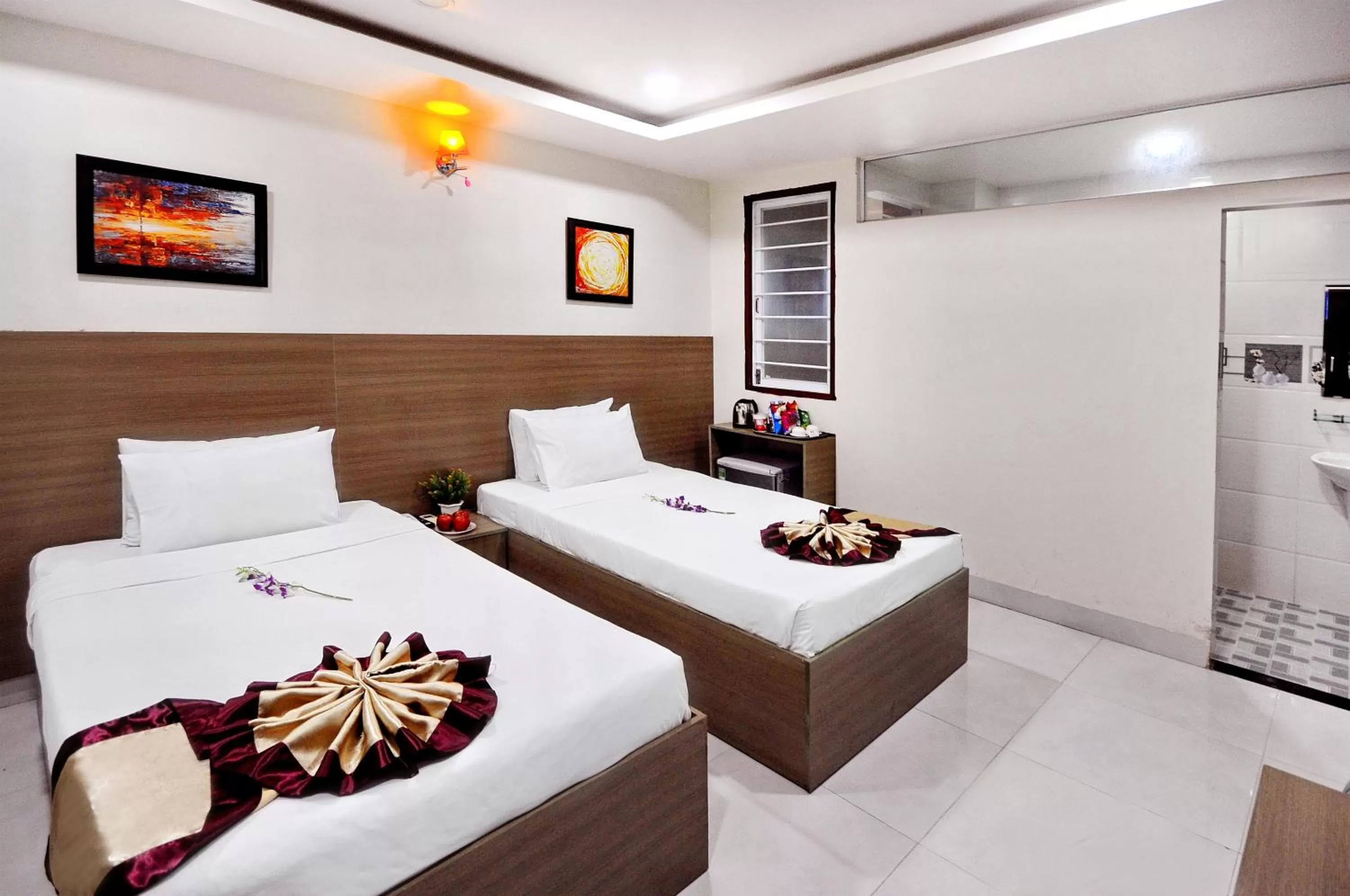 Bed in Arise Seaside Hotel