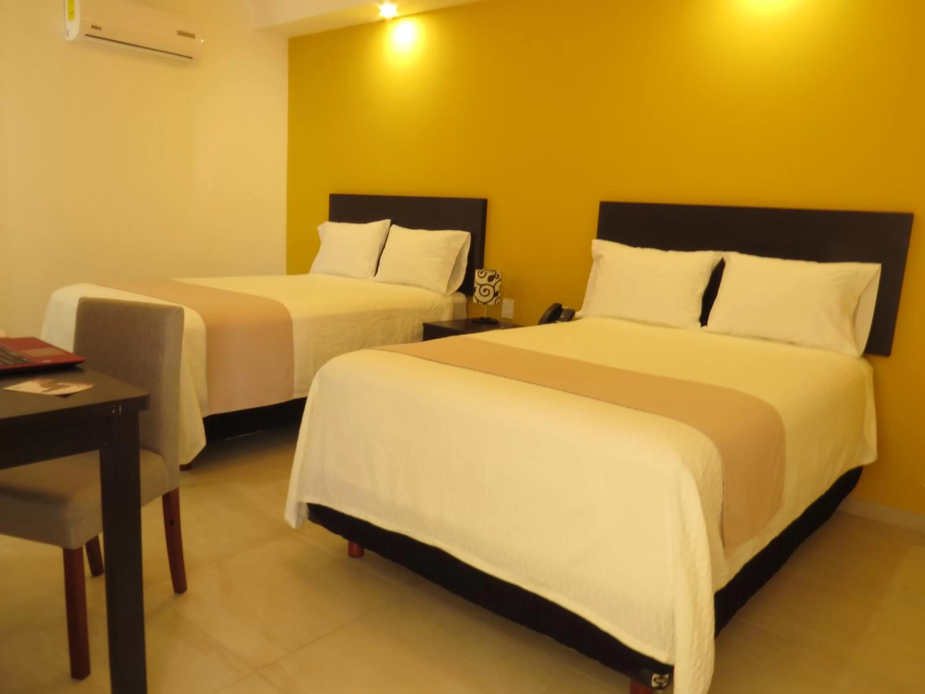 Bed in Casa Blanca Hotel