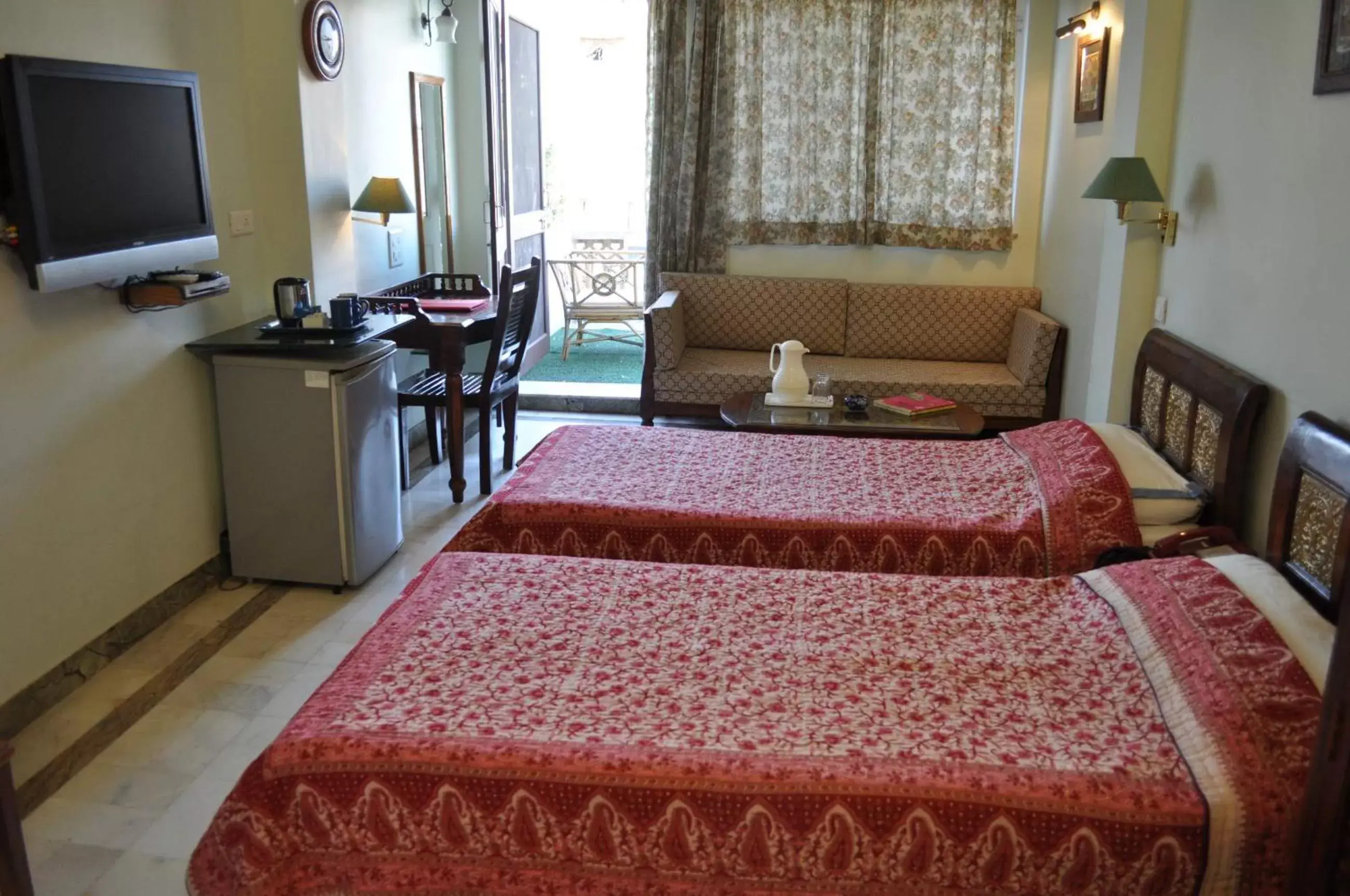 Photo of the whole room, Bed in Hotel Arya Niwas