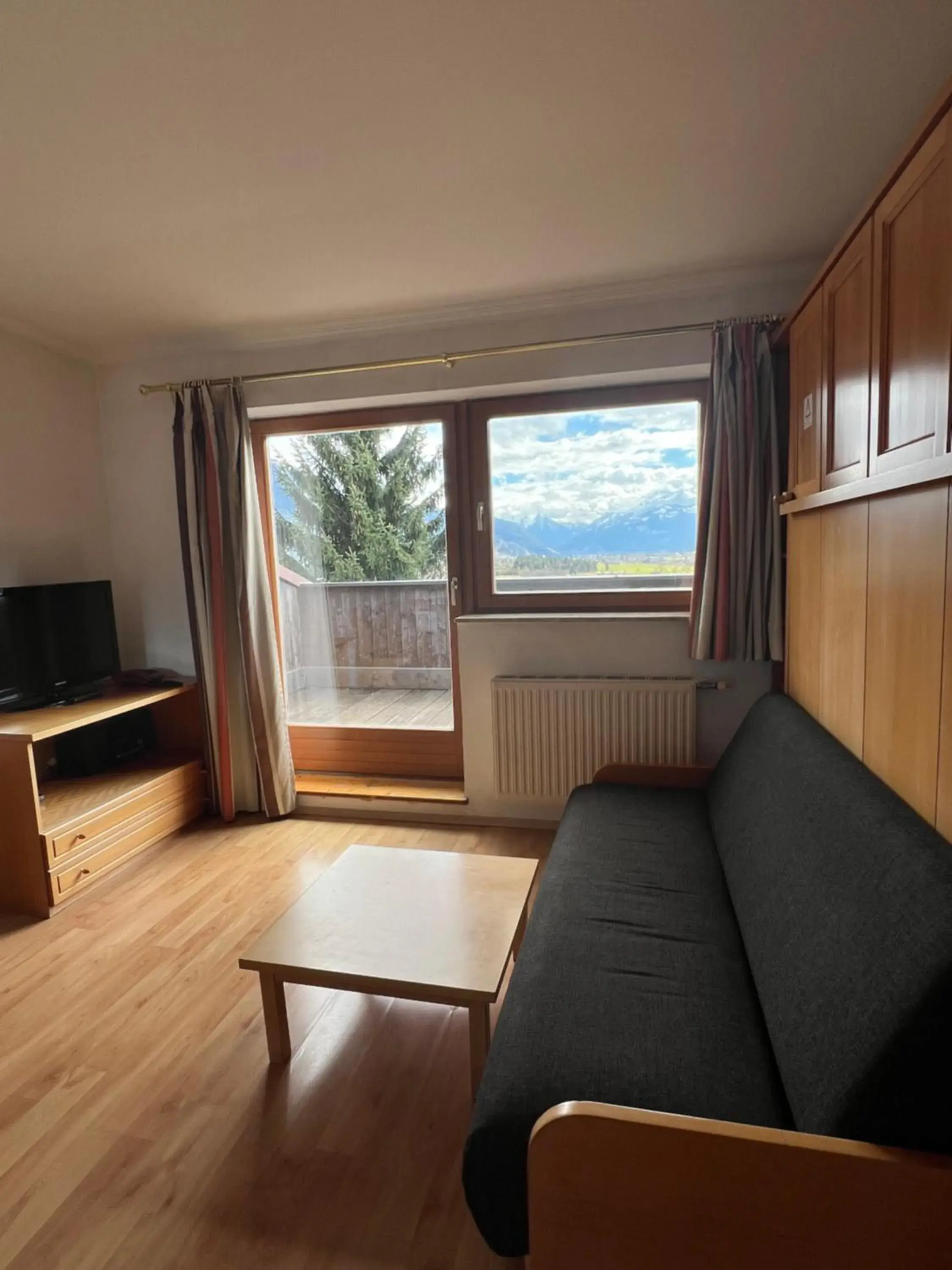 Living room, Seating Area in Ramada Residences by Wyndham Saalfelden