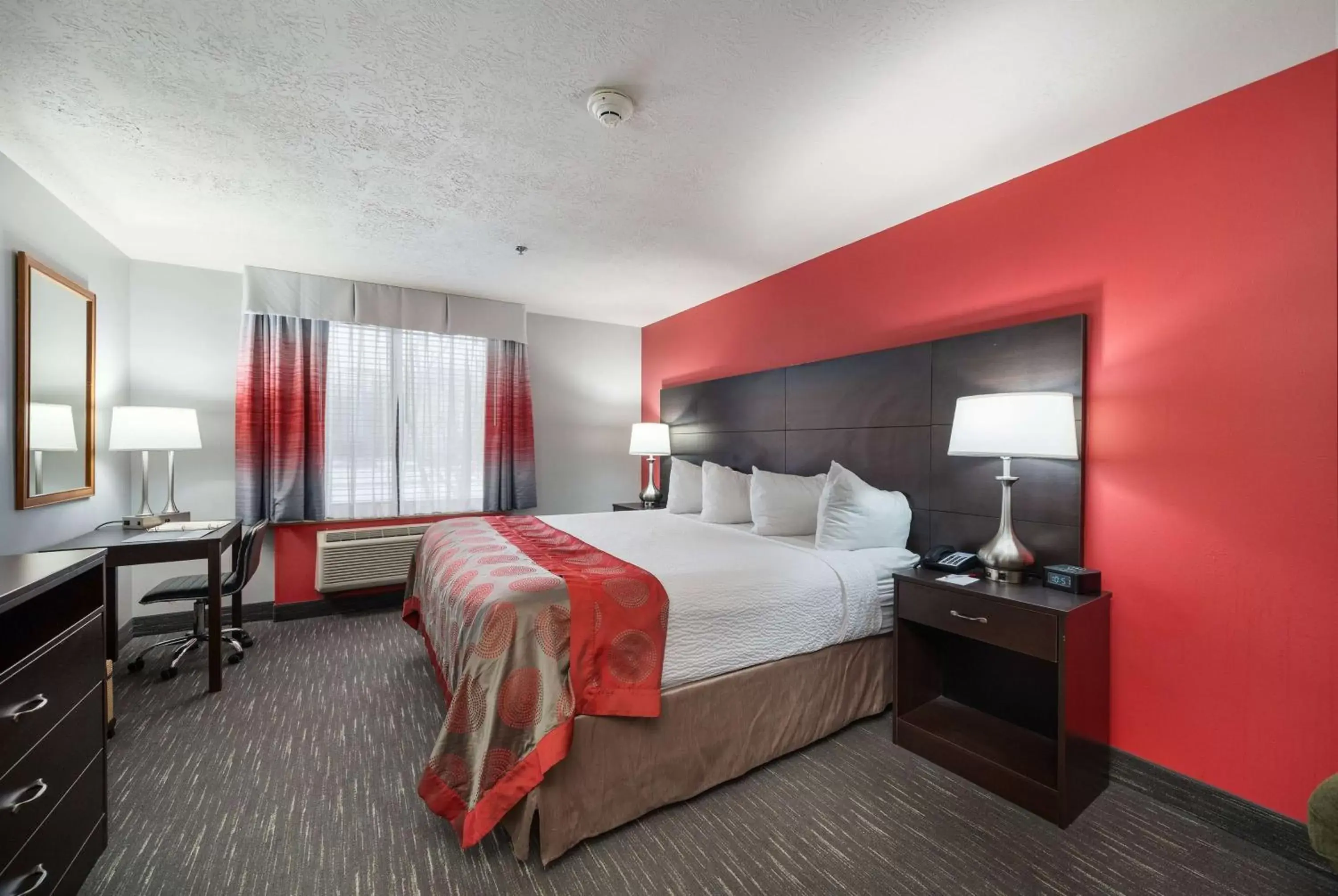 Photo of the whole room, Bed in Ramada by Wyndham Sioux Falls Airport - Waterpark Resort & Event Center