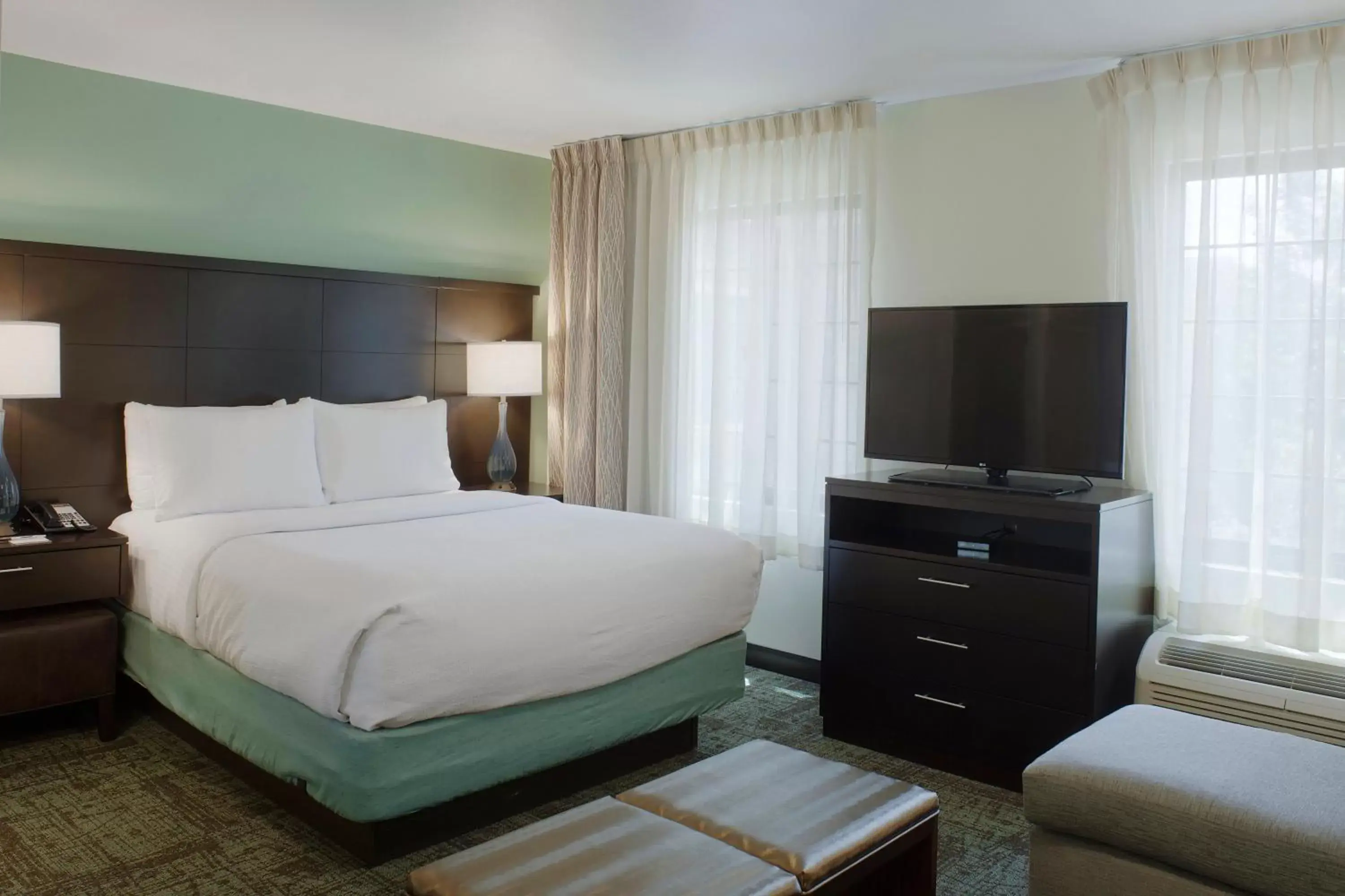 Photo of the whole room, Bed in Staybridge Suites Fayetteville, an IHG Hotel