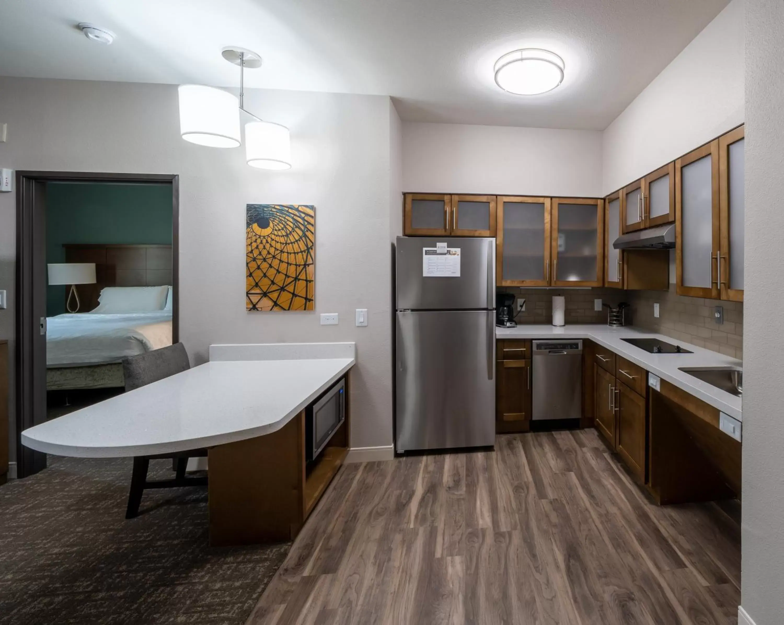 Photo of the whole room, Kitchen/Kitchenette in Staybridge Suites Houston East - Baytown, an IHG Hotel