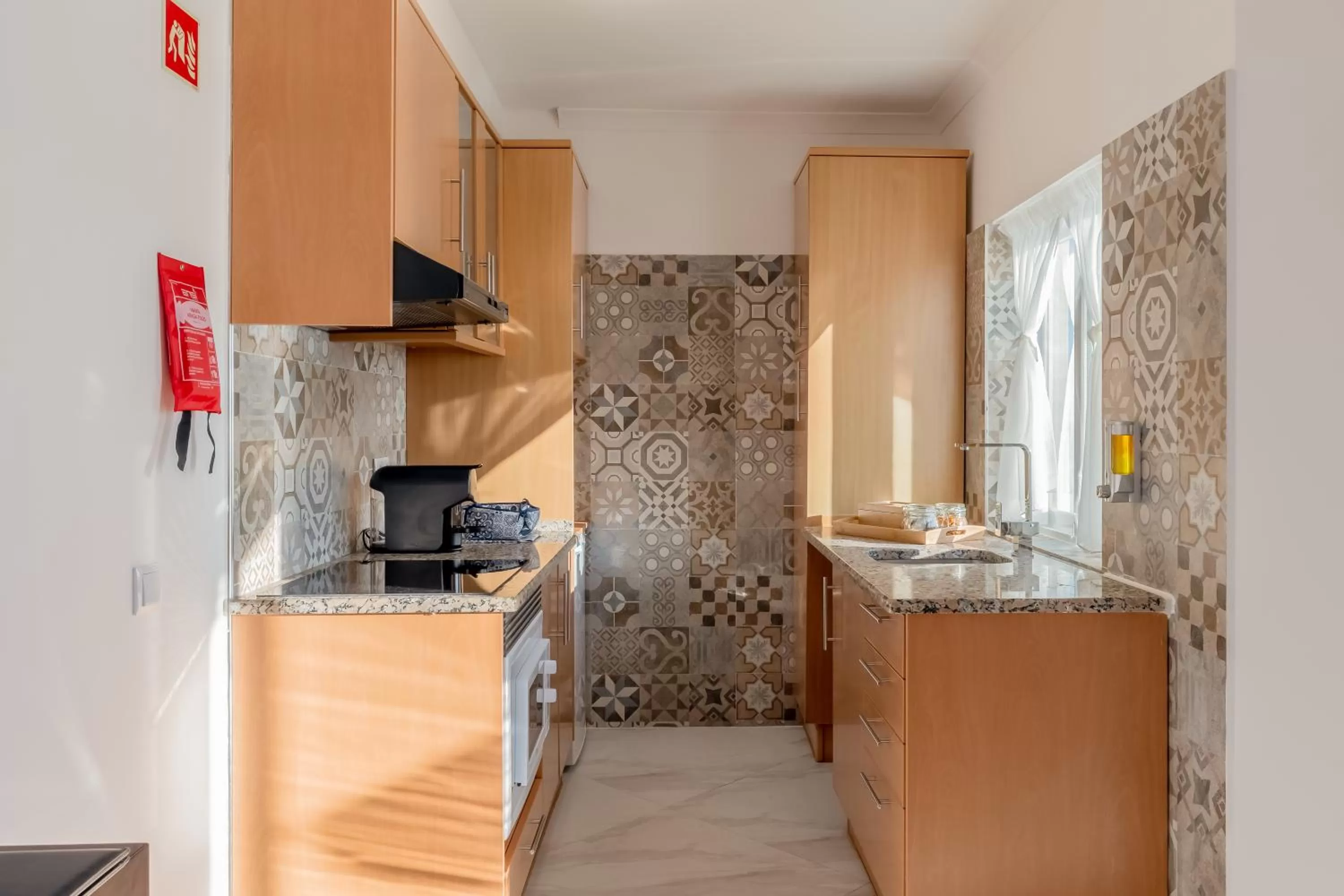 Kitchen or kitchenette in Monicca Collection Suites and Residences