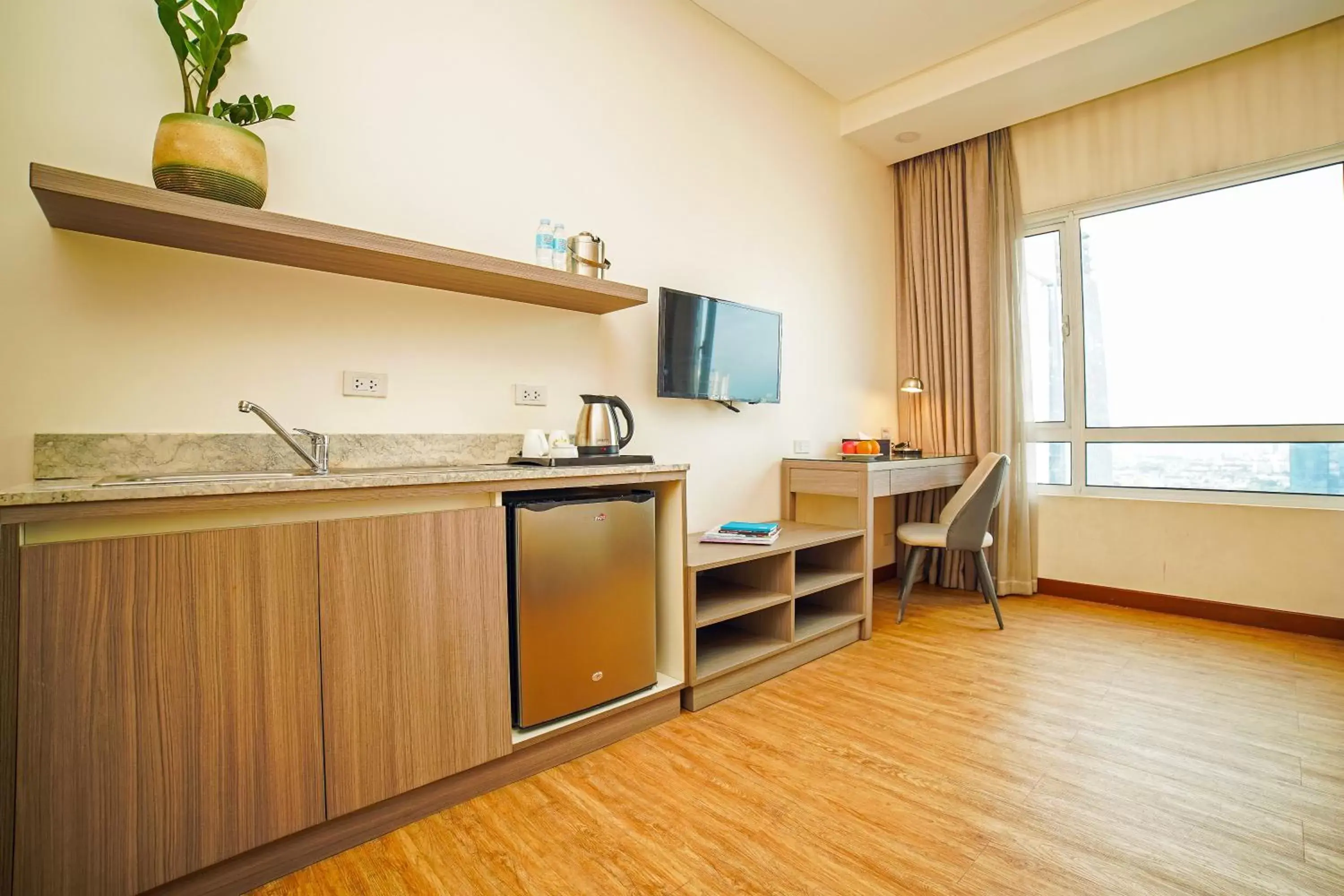 Bedroom, Kitchen/Kitchenette in One Pacific Place Serviced Residences - Multiple Use Hotel