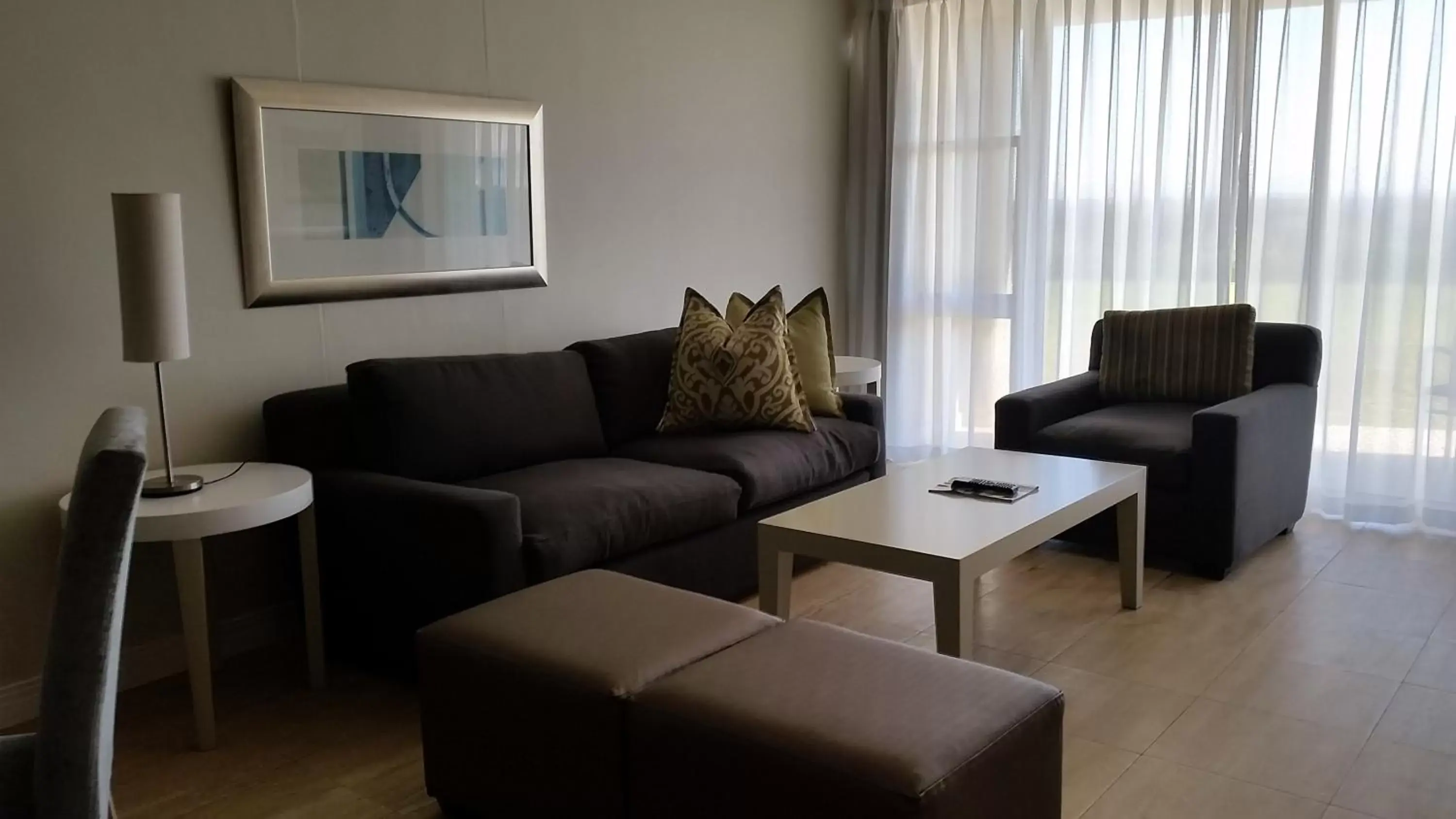 Living room, Seating Area in Lagoon Beach Hotel & Spa