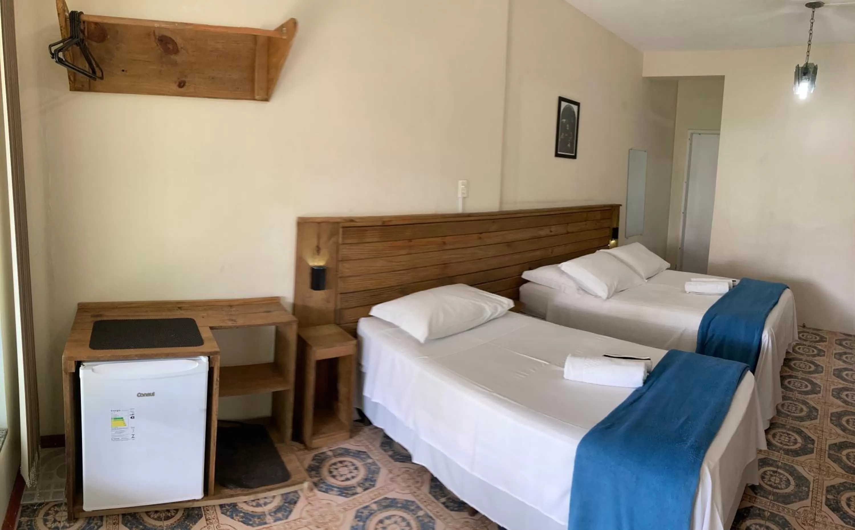 Bed in Pousada Marinamarela