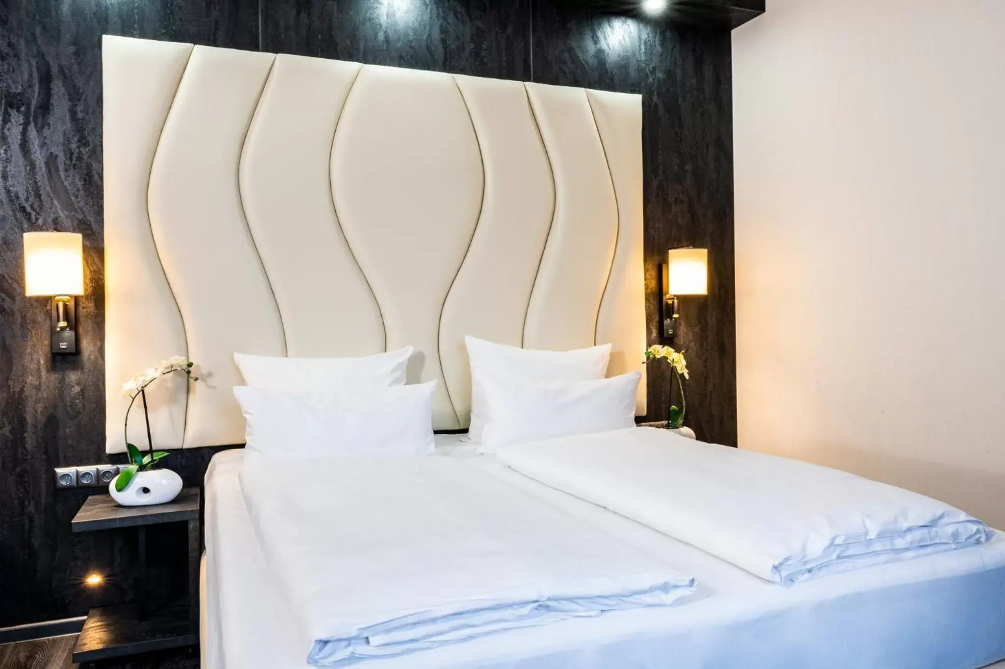 Bed in PLAZA Premium Schwerin Sure Hotel Collection by Best Western