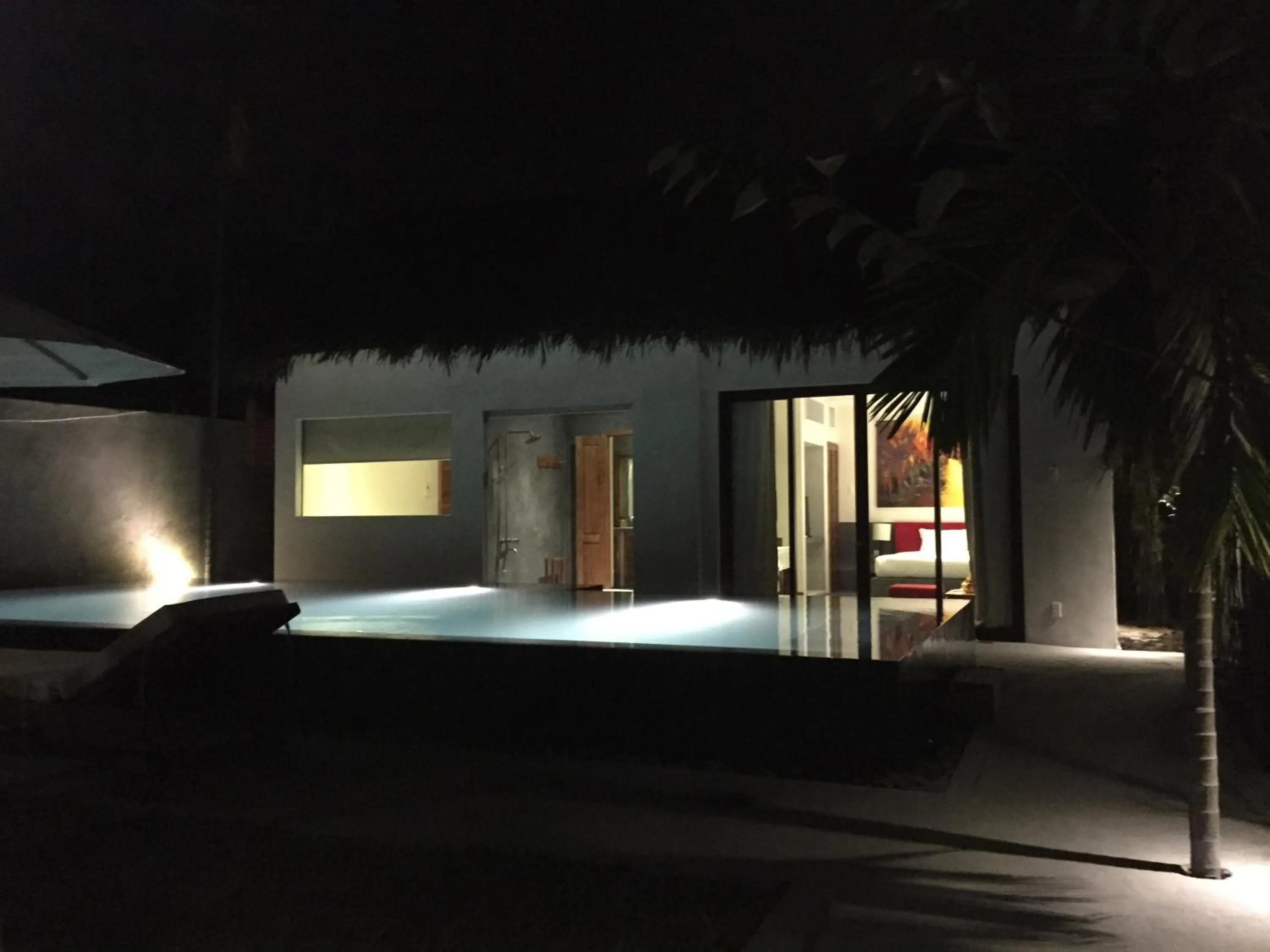 Bed in Palm View Villa