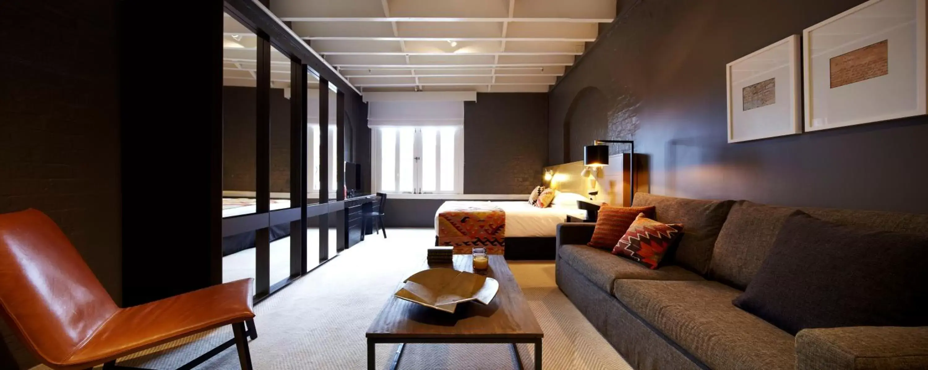 Bedroom, Seating Area in Harbour Rocks Hotel Sydney