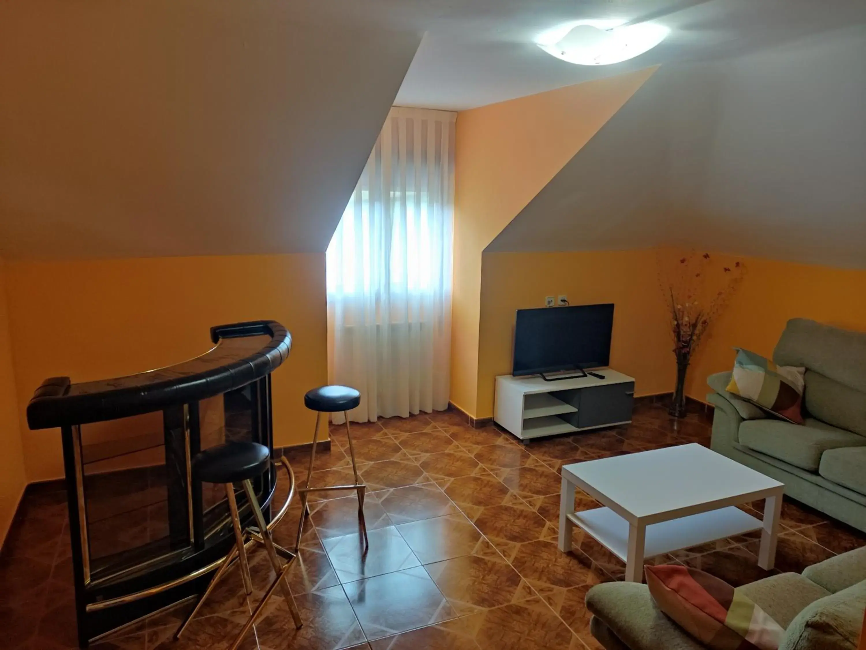 Communal lounge/ TV room, Seating Area in Hotel Peñagrande