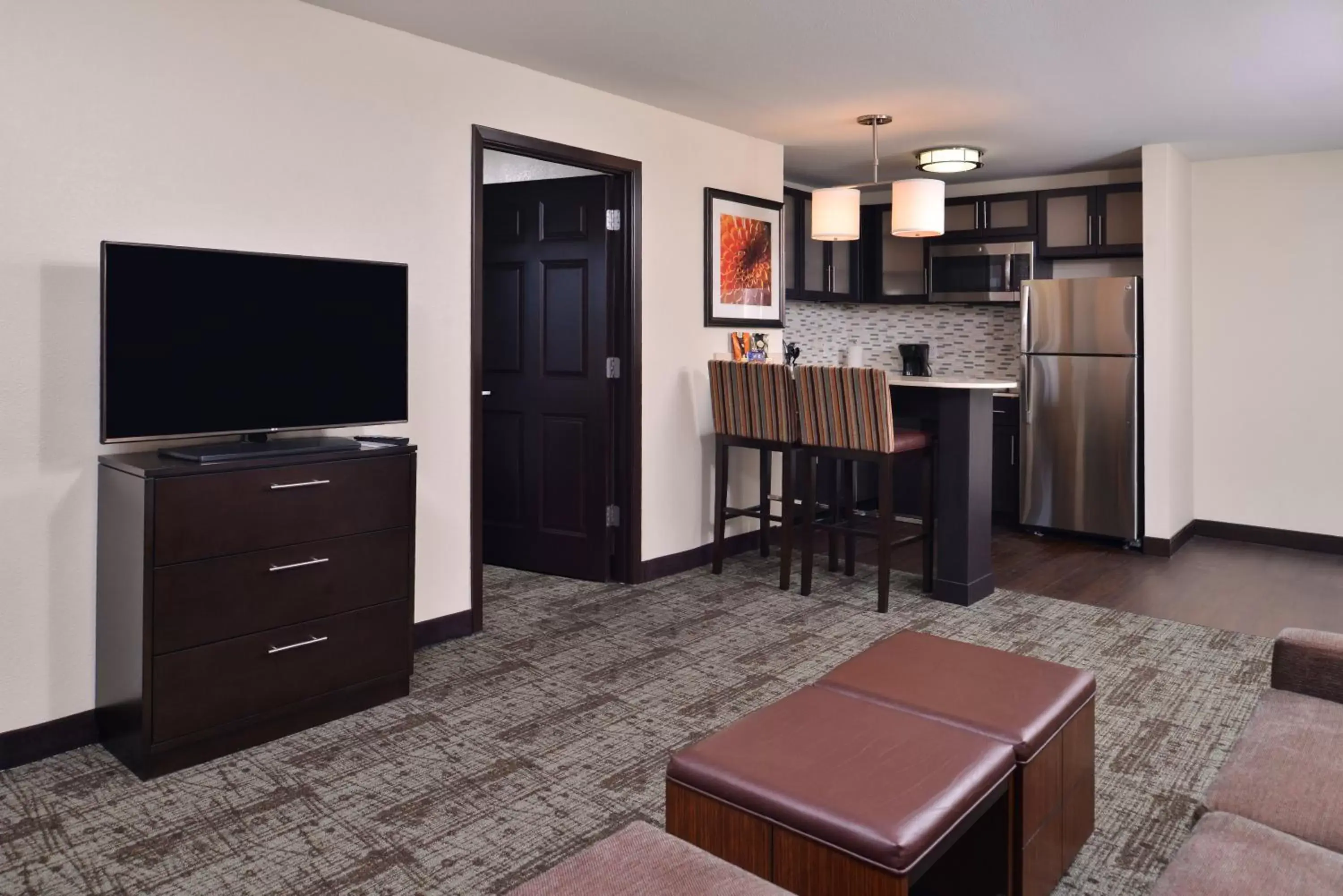 Photo of the whole room, TV/Entertainment Center in Staybridge Suites Wichita Falls, an IHG Hotel
