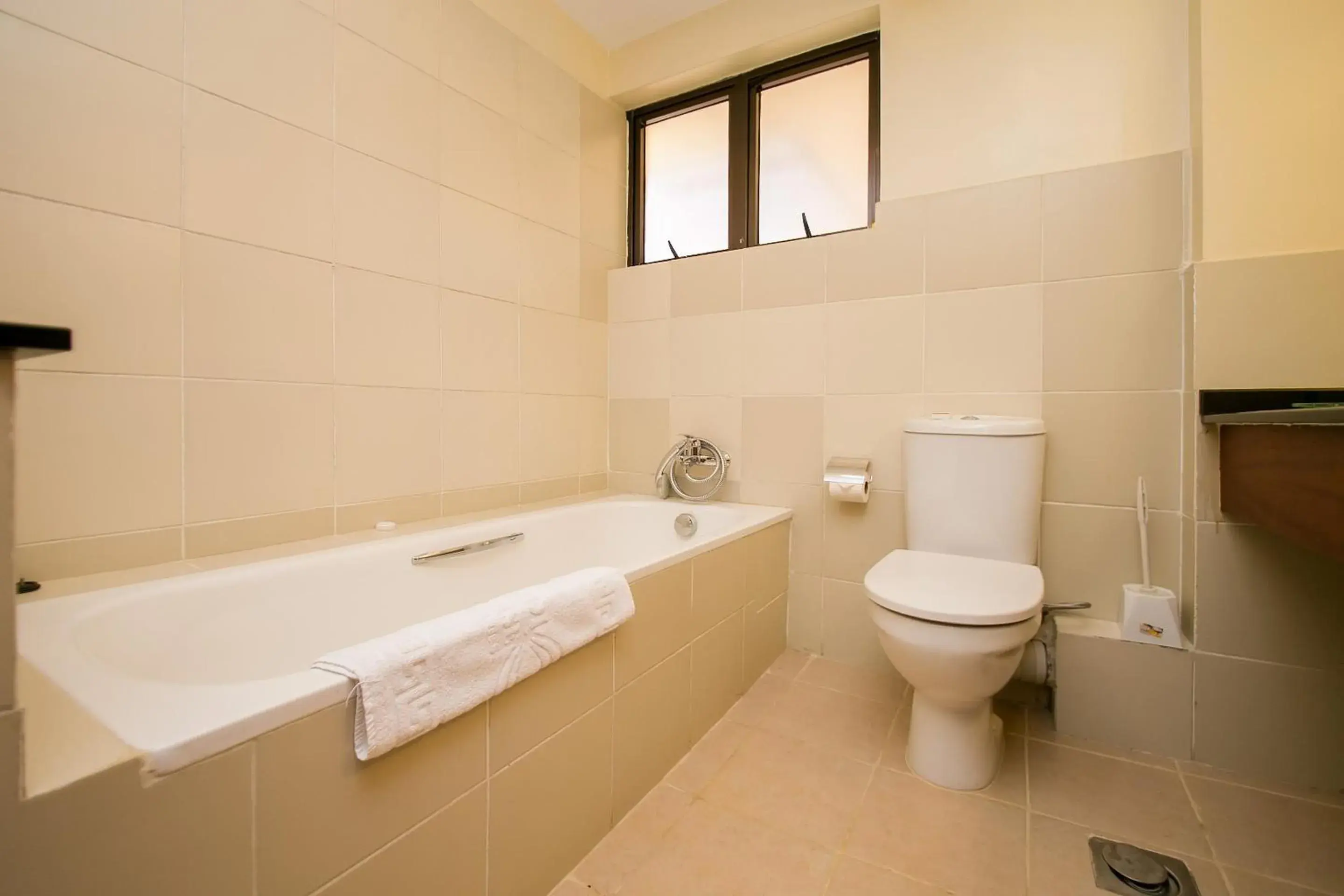 Bathroom in Waridi Paradise Hotel and Suites