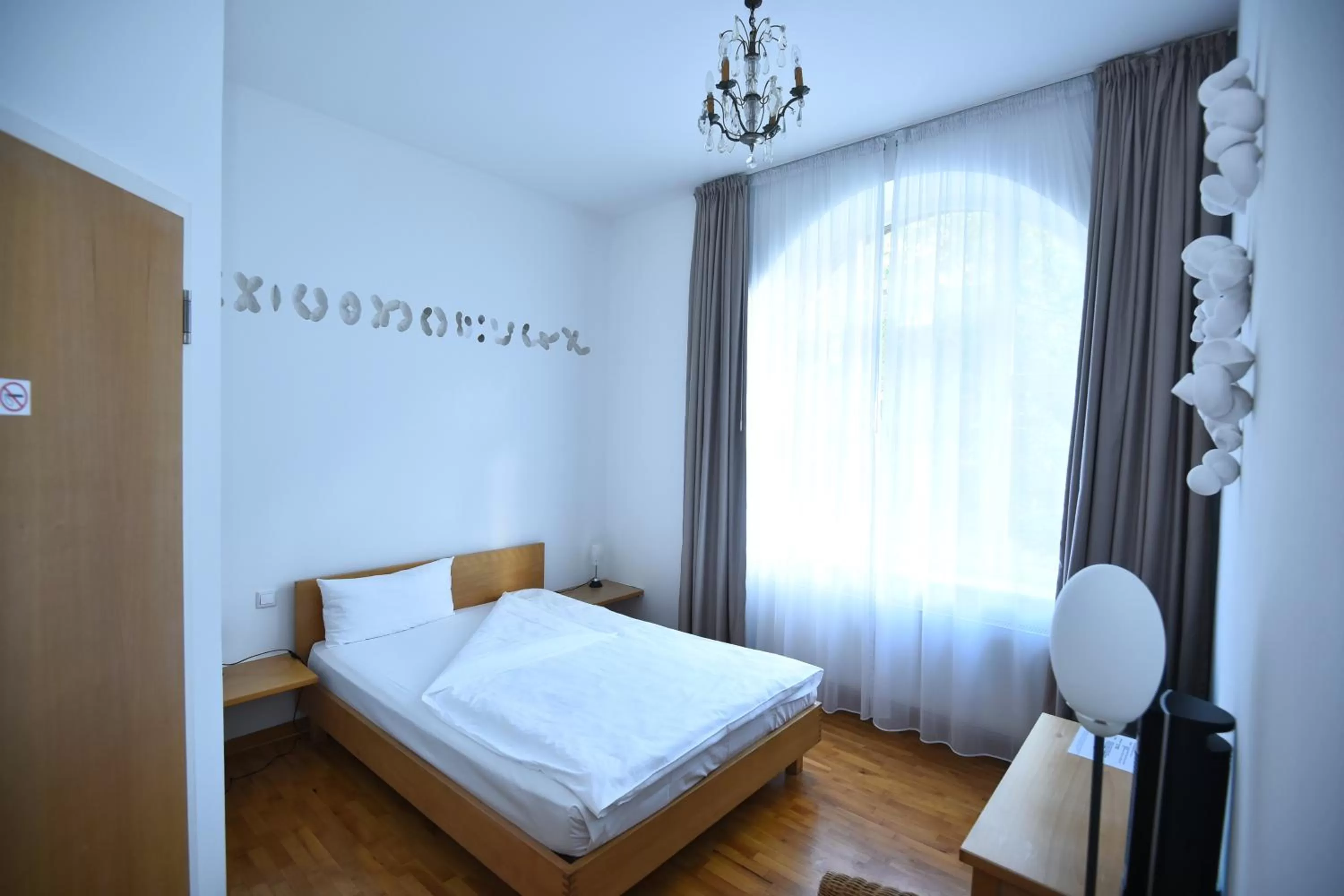 Bed in Art-Hotel Robert Mayer