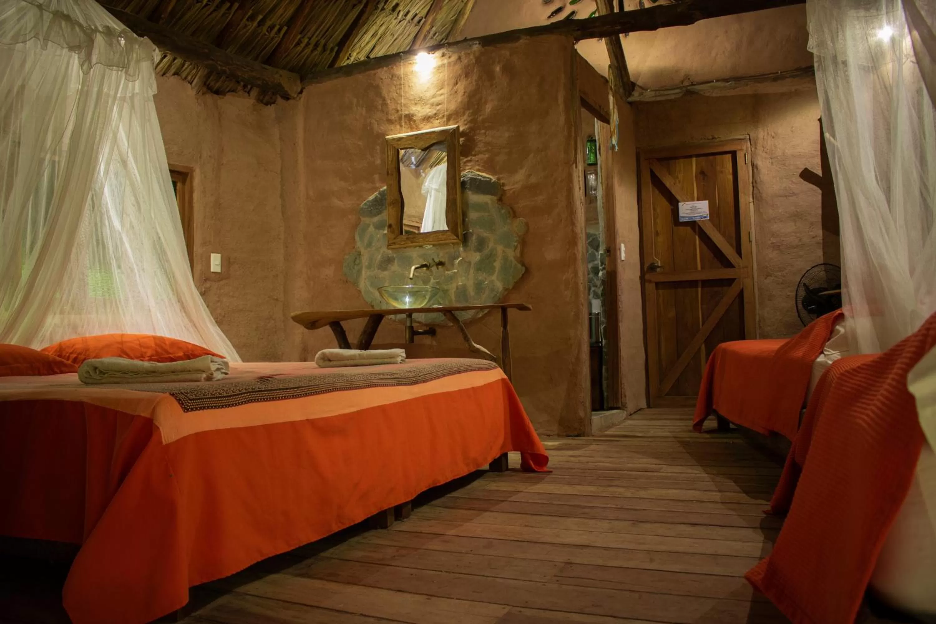Photo of the whole room, Bed in Ecolodge Cosmogénesis