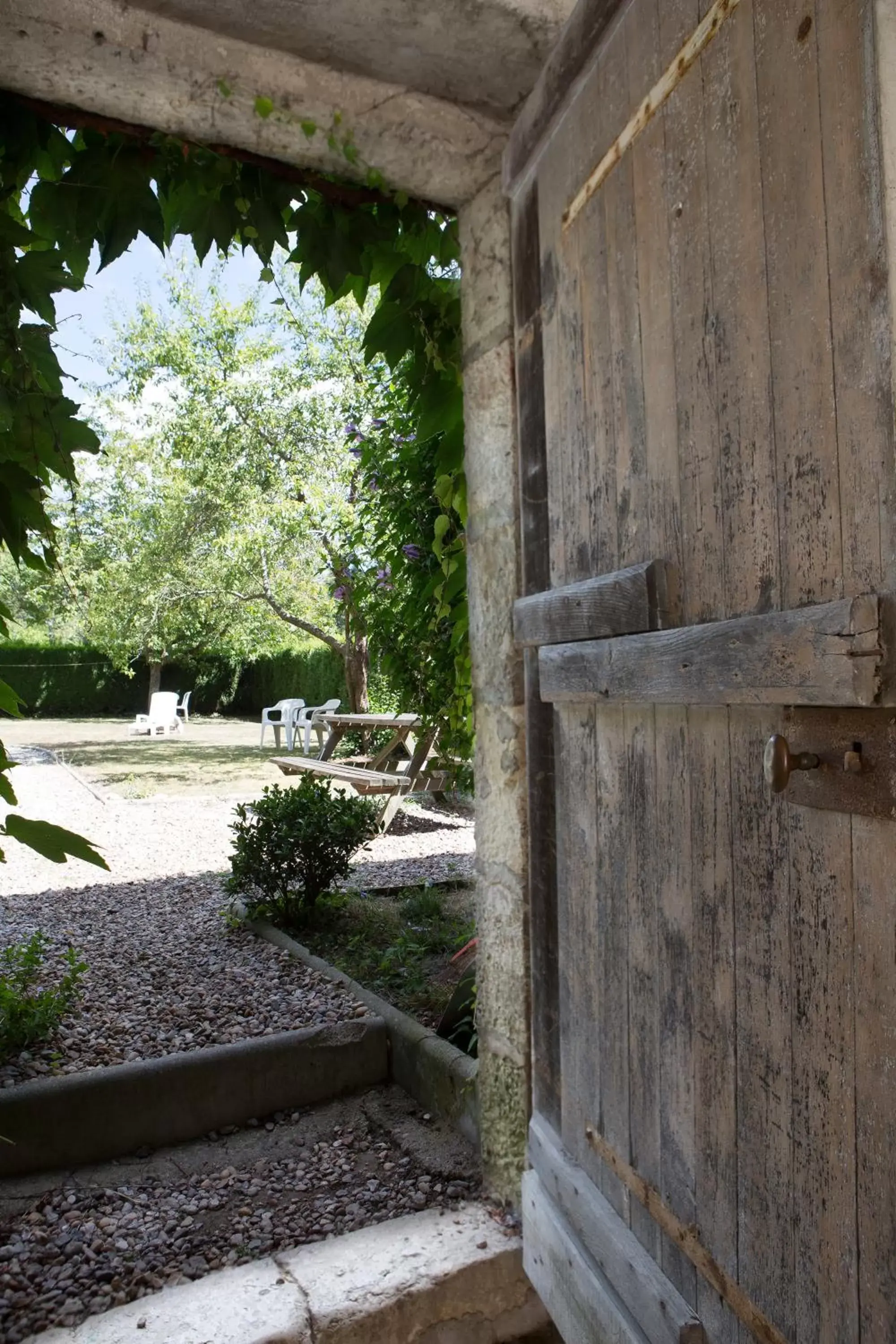 Garden view in Logis Hotel Le Cerf