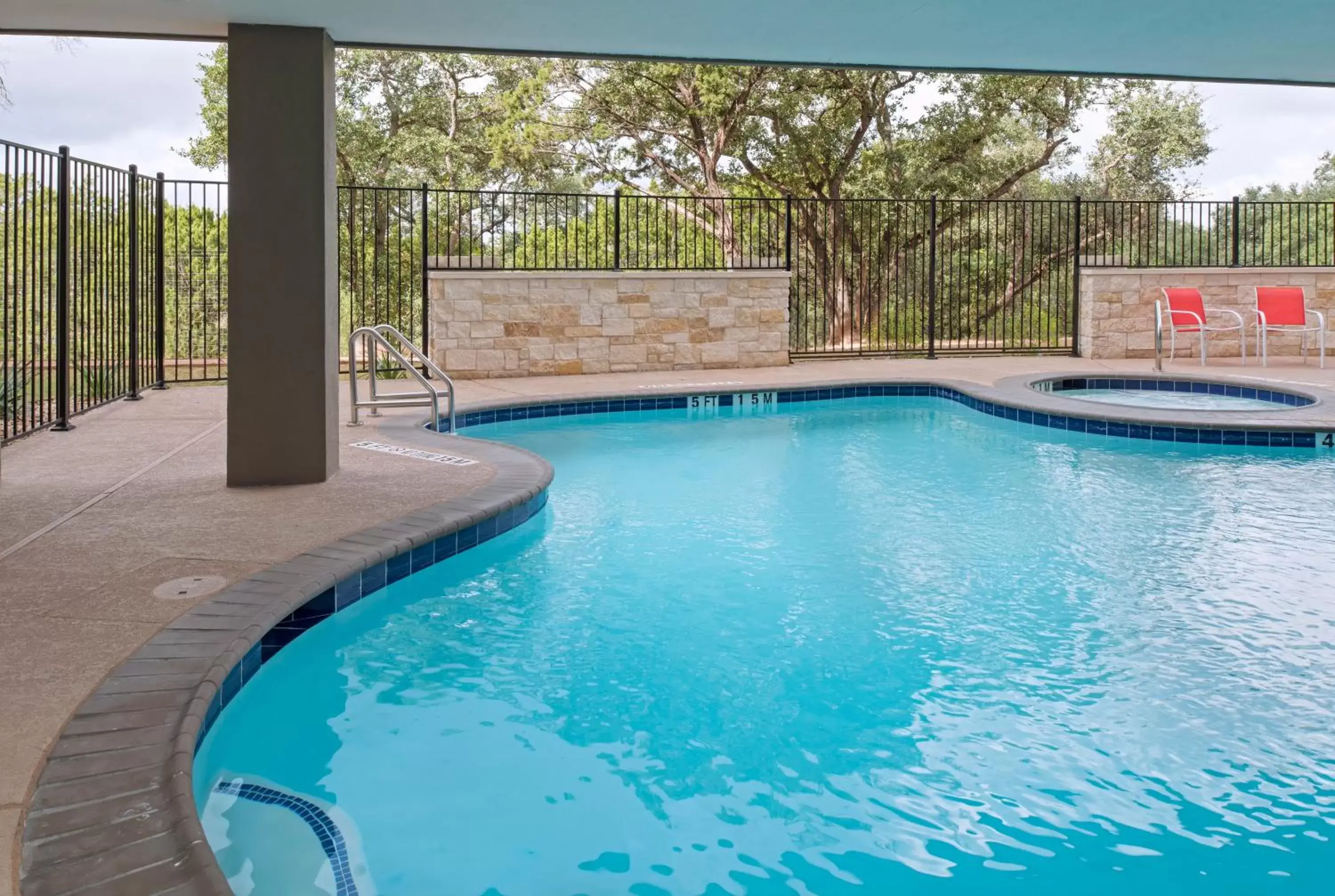 Swimming pool in Holiday Inn Express & Suites Austin NW - Four Points by IHG Swimming pool in Holiday Inn Express & Suites Austin NW - Four Points by IHG