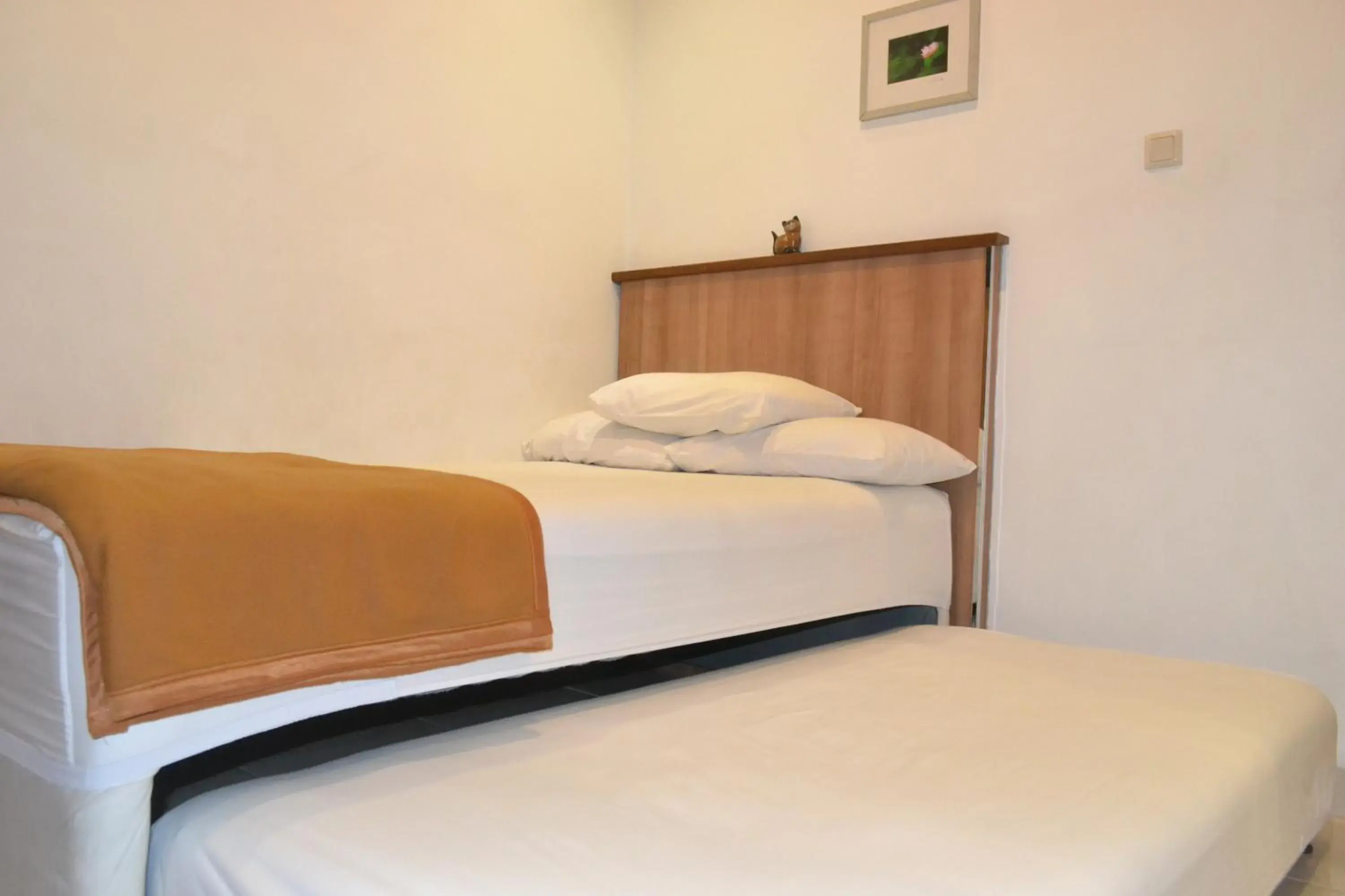 Bed in Cabin Hotel Bhayangkara