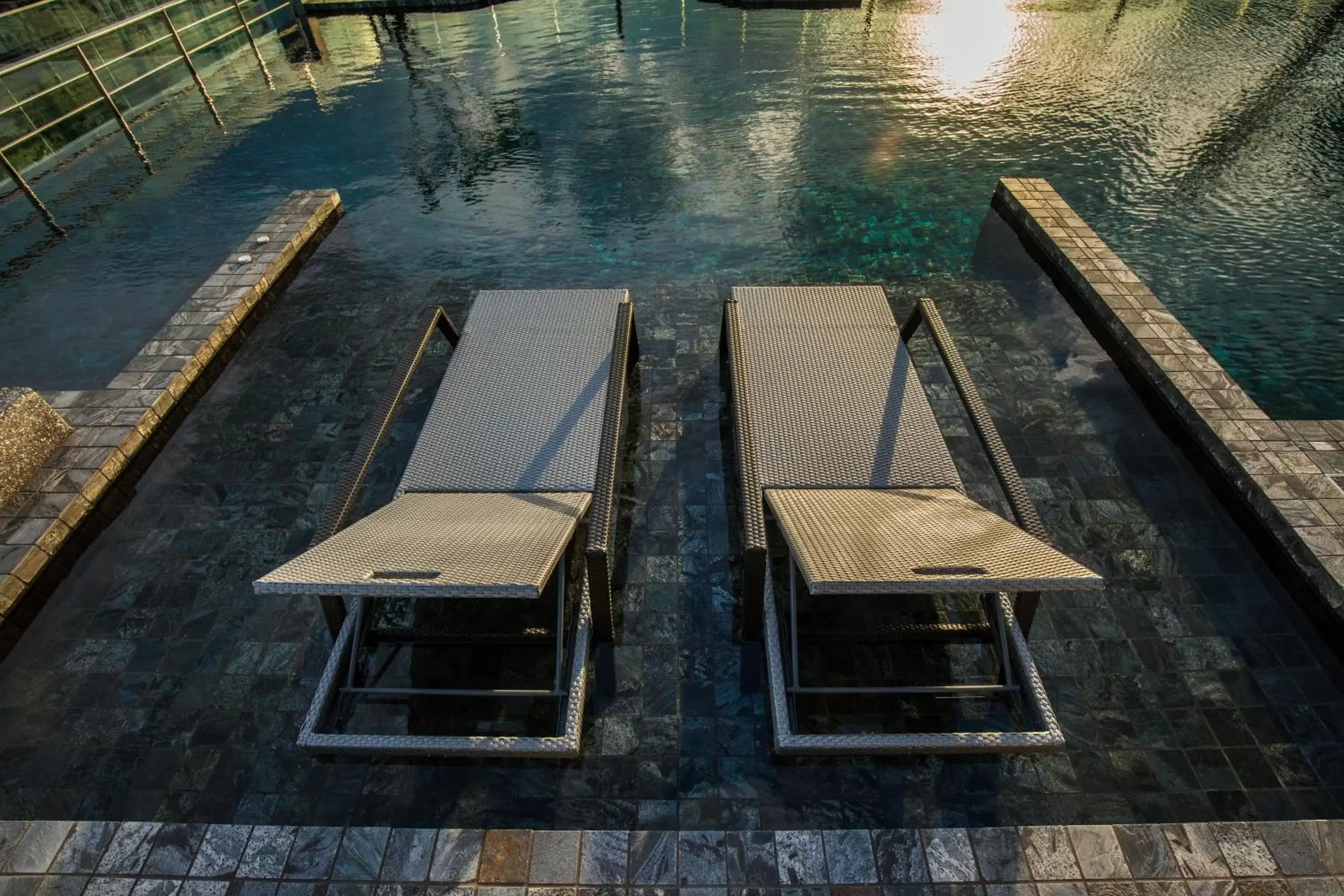 Swimming pool in De Botan Srinakarin Hotel & Residence